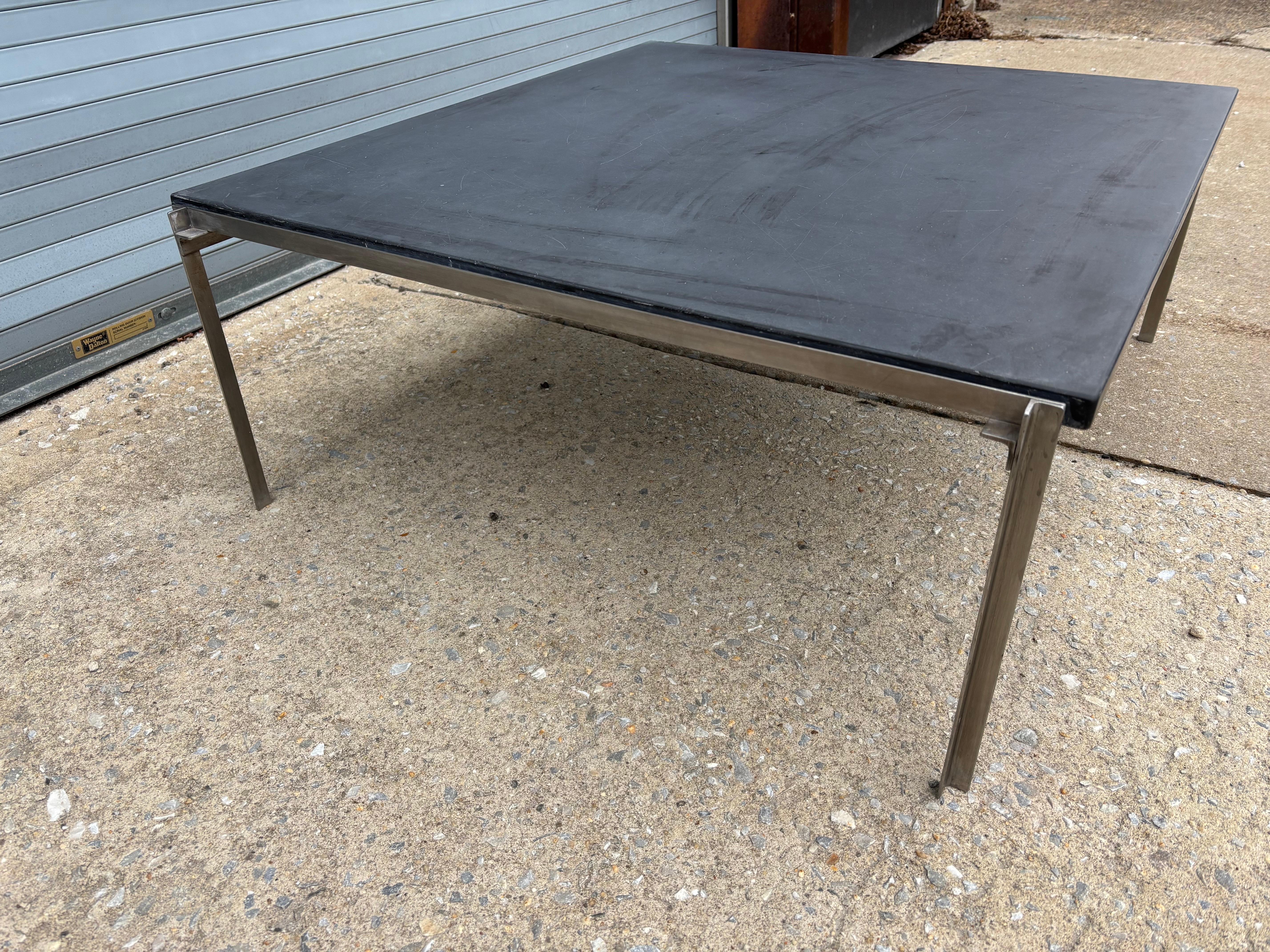 Slate and Stainless Steel Coffee Table in the look and style of Pouil Kjaerholm.  Probably American Made with Stainless Angle Iron.  Nice Sturdy design.  Slate shows signs of use and wear, can be polished or use with its natural patina.