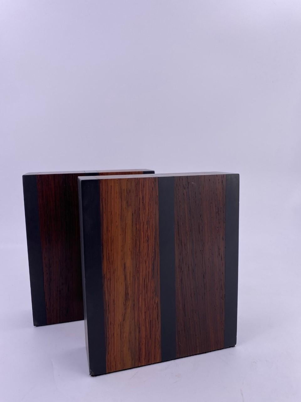 Sculptural and linear. Slate and walnut bookends by Harpswell House. These are often attributed to Paul Evans and Phillip Lloyd Powell, however that is probably not accurate. Nonetheless, they are well made and heavy. Crafted in Maine, 1960s.