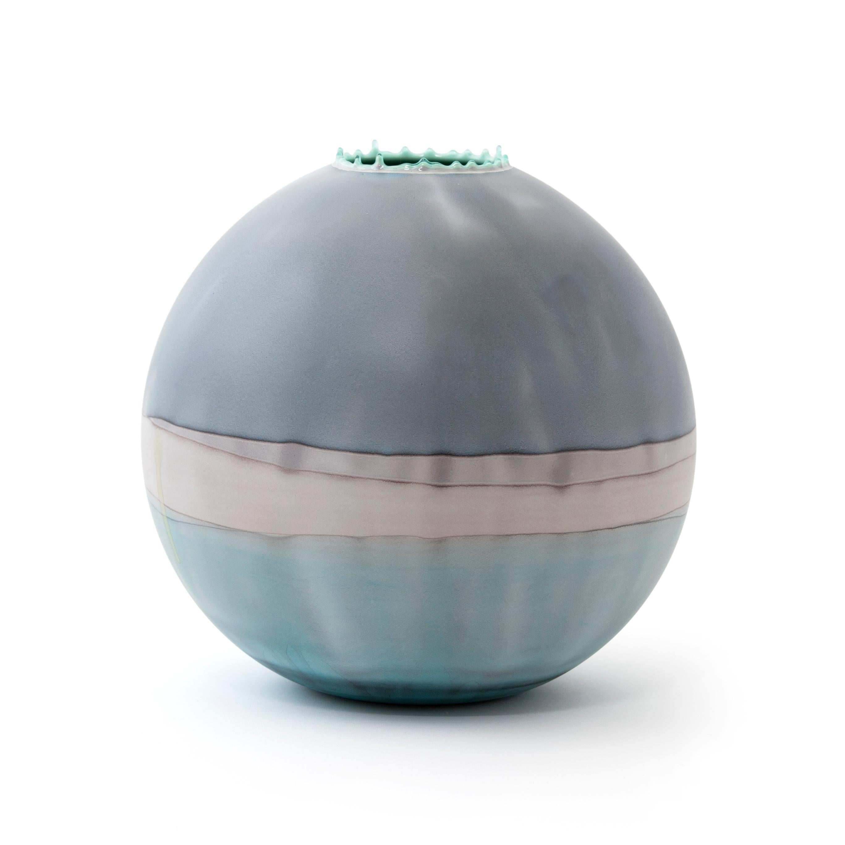 Slate blue Jupiter vase by Elyse Graham.
Dimensions: W 28 x D 28 x H 30.5 cm.
Materials: plaster, resin.
Molded, dyed, and finished by hand in la. Customization.
Available.
All pieces are made to order.

This collection of vessels is inspired