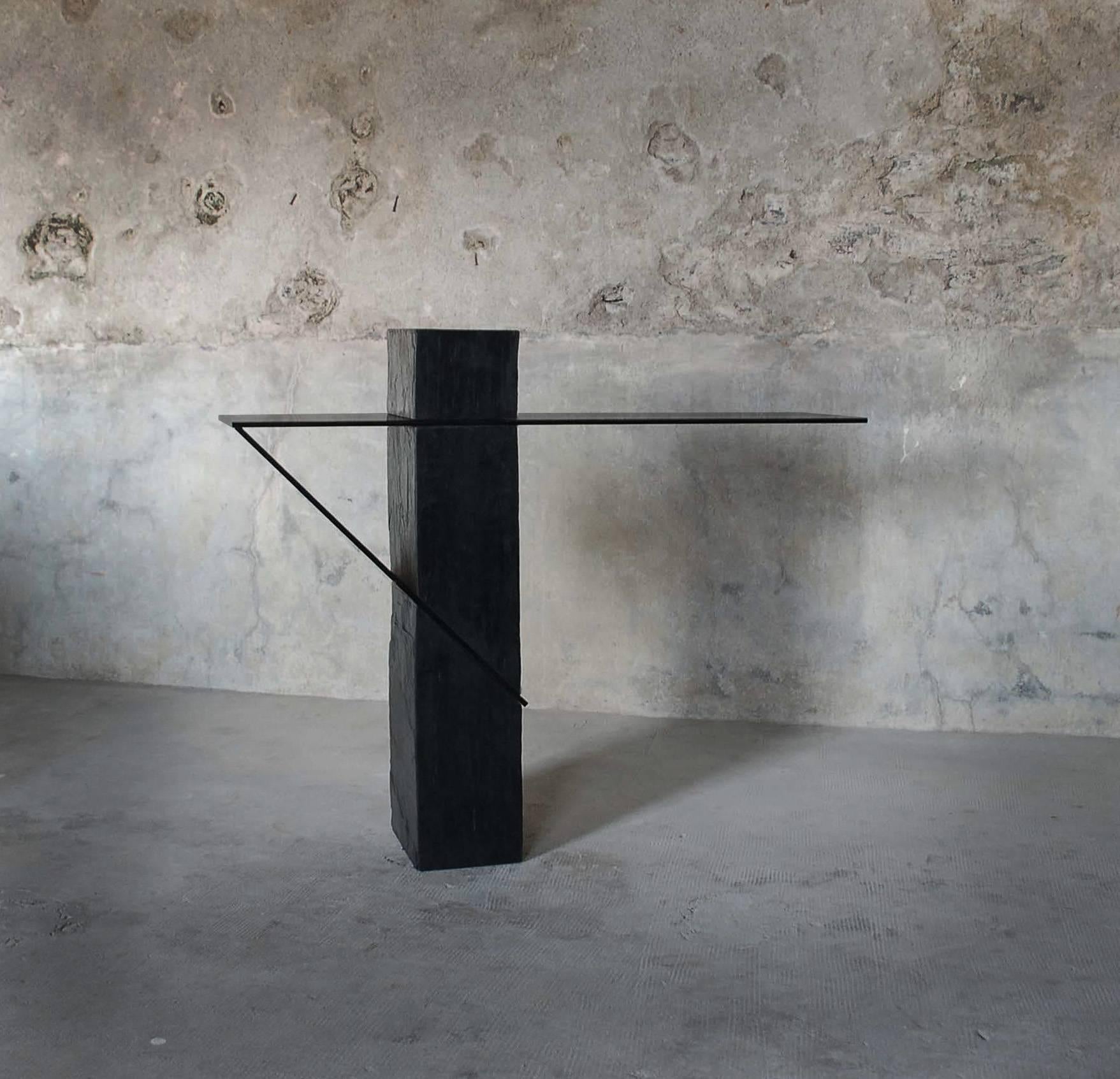 Athlétique console
Edition of 8
Frederic Saulou
Materials: Trélazé black slate, gray smoked glass.
Measures: Total length : 110 cm x W 25 cm x 105 cm
Base in slate : l 25 x L 18 x H 105 cm
Height Glass top: 90 cm

