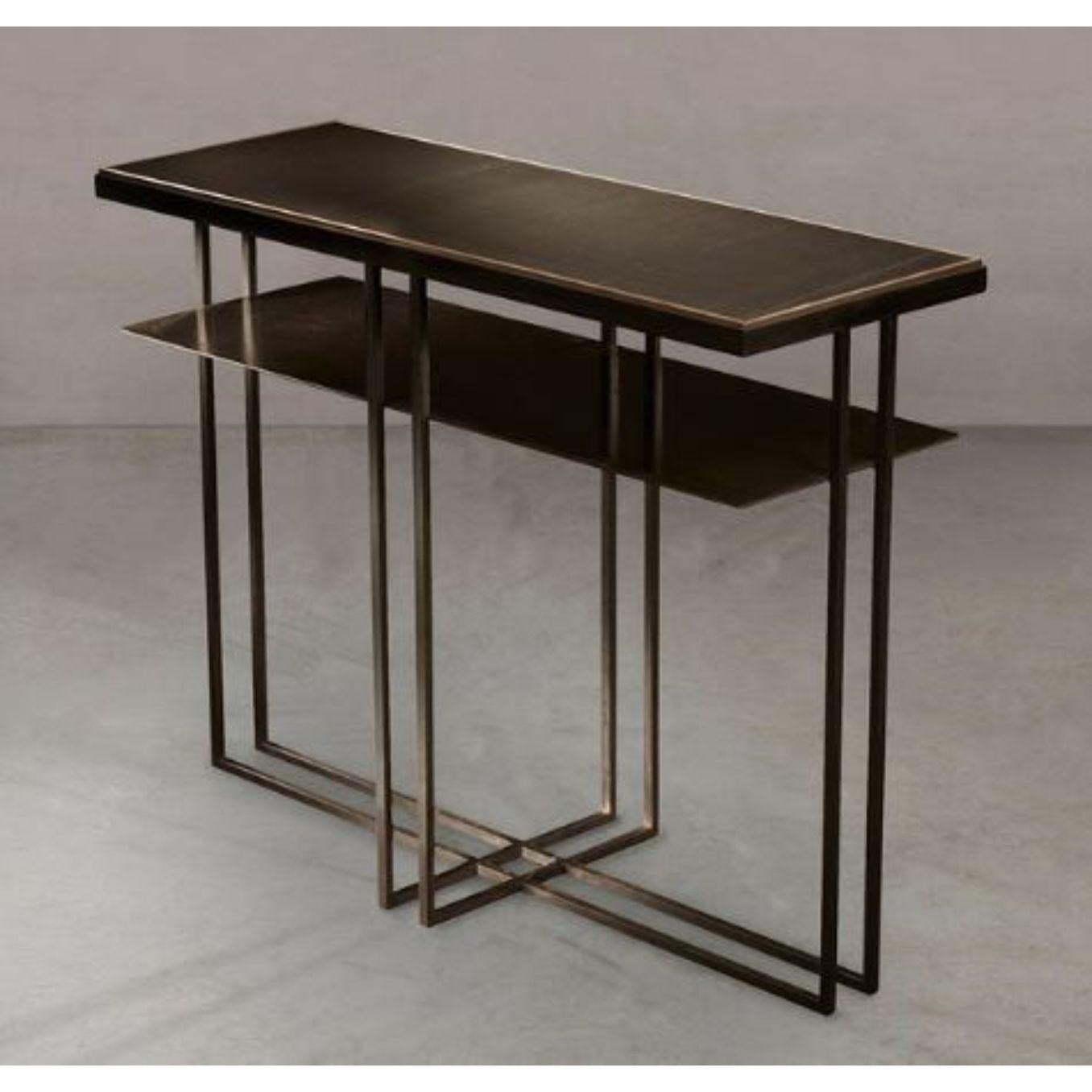 Slate cross Binate side table by Novocastrian
Dimensions: W 25 x D 71 x H 55 cm 
Materials: A range of Cumbrian slates, blackened steel, hand patinated brass, limestone.
Also available in different dimensions.


Novocastrian

We are