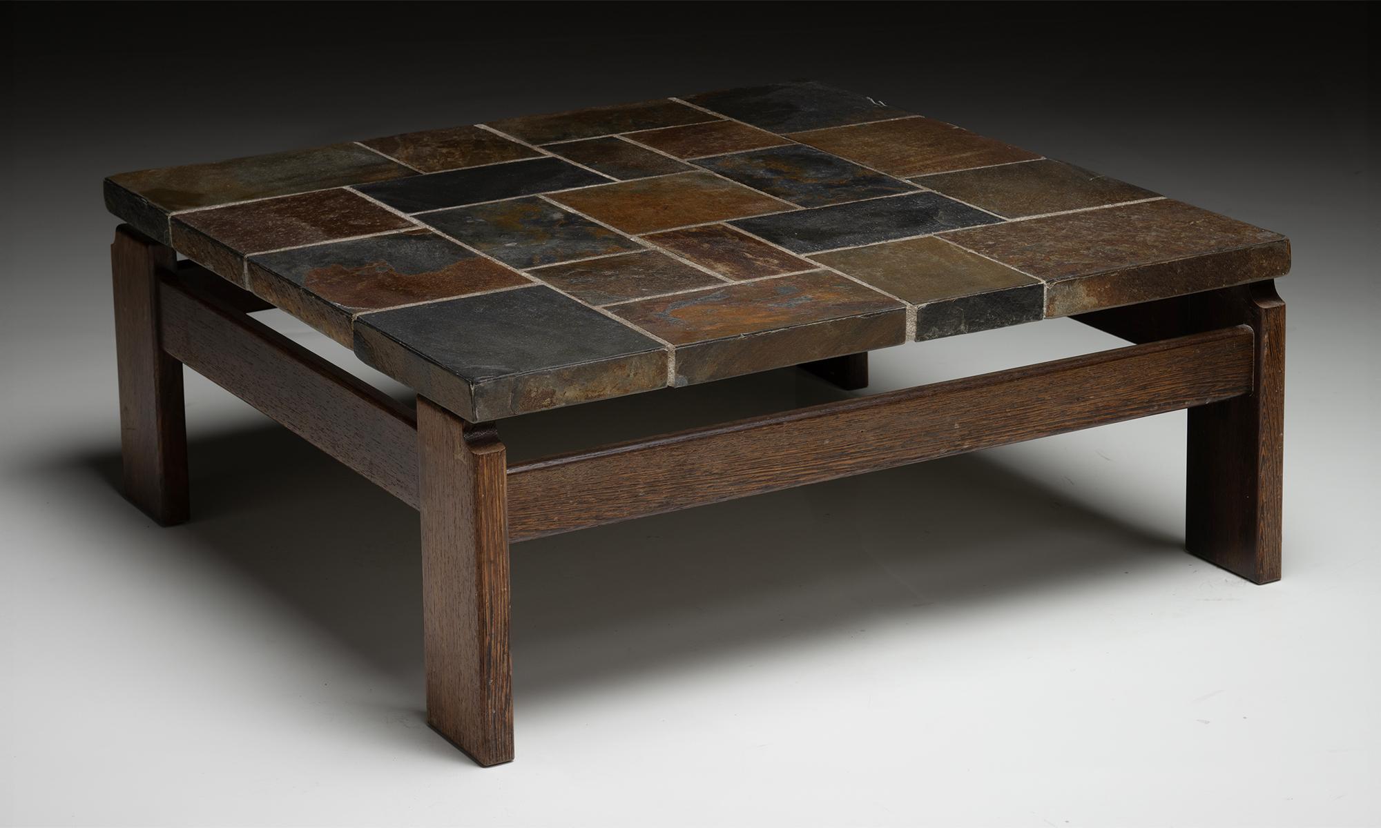 Slate Top Coffee Table

France circa 1970

Tiled slate surface with stained wooden frame.

35.5”w x 35.5”d x 14.5”h