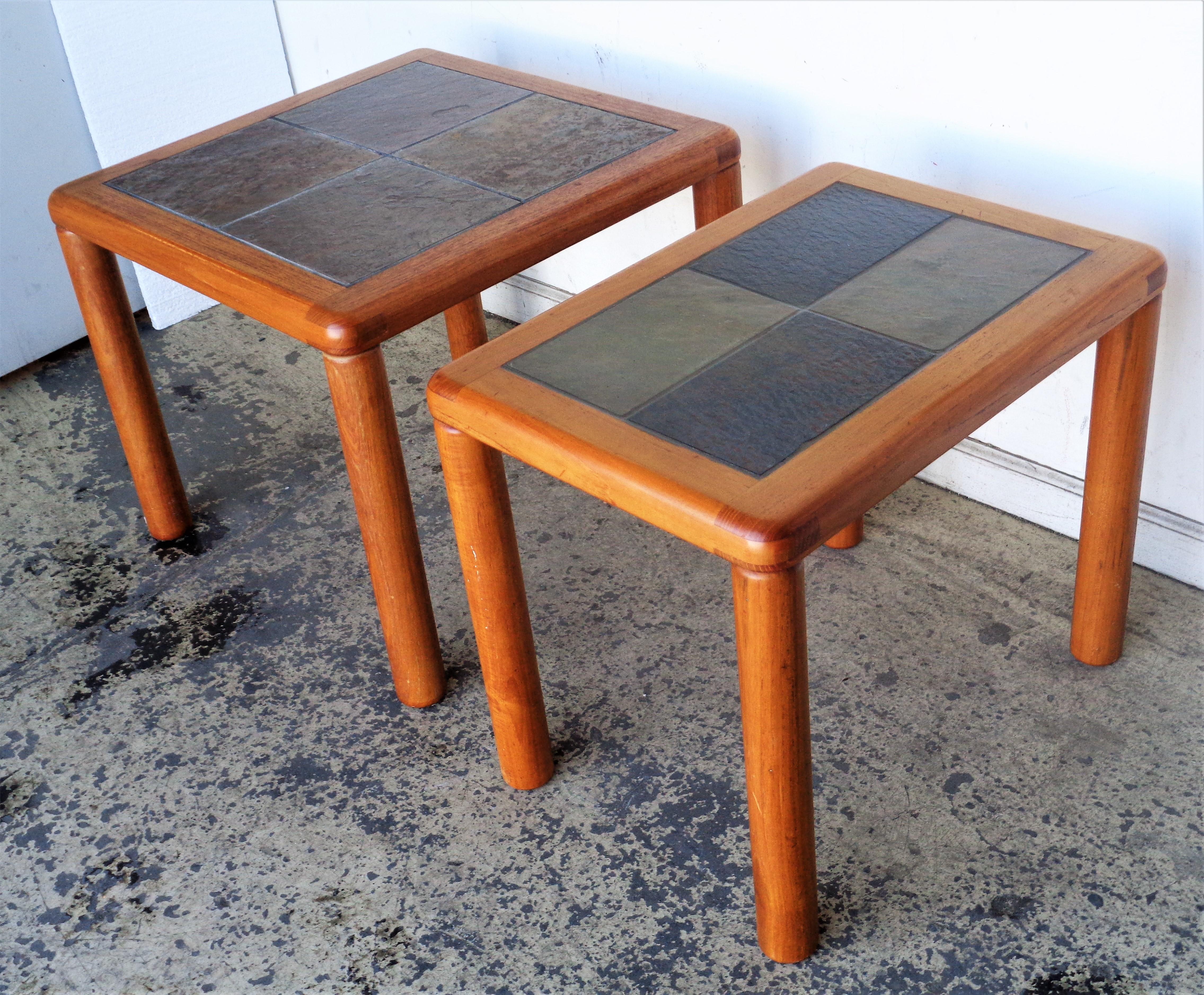 Scandinavian modern teak wood side tables with slate inset tile tops by A/S Haslev Mobelsnedkeri - made in Denmark, attributed to Tue Poulsen. Both are label signed on underside. Circa 1960's. Rectangular table measures 19 1/2 inches high by 24