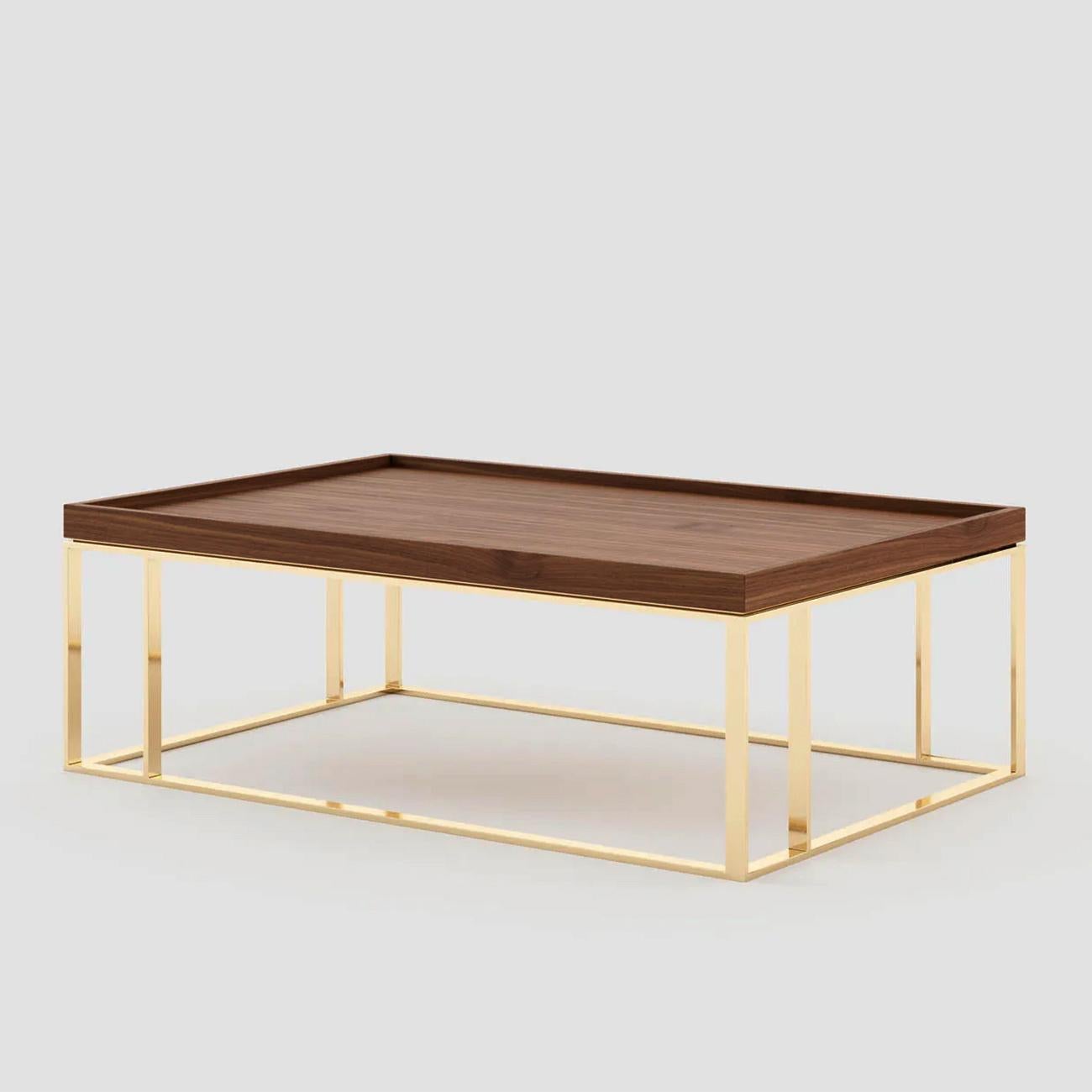 Coffee table slater with solid walnut top and
with polished stainless steel base in gold finish.
Also available with other wooden finishes for top
and other stainless steel finishes, on request including
up-charge.