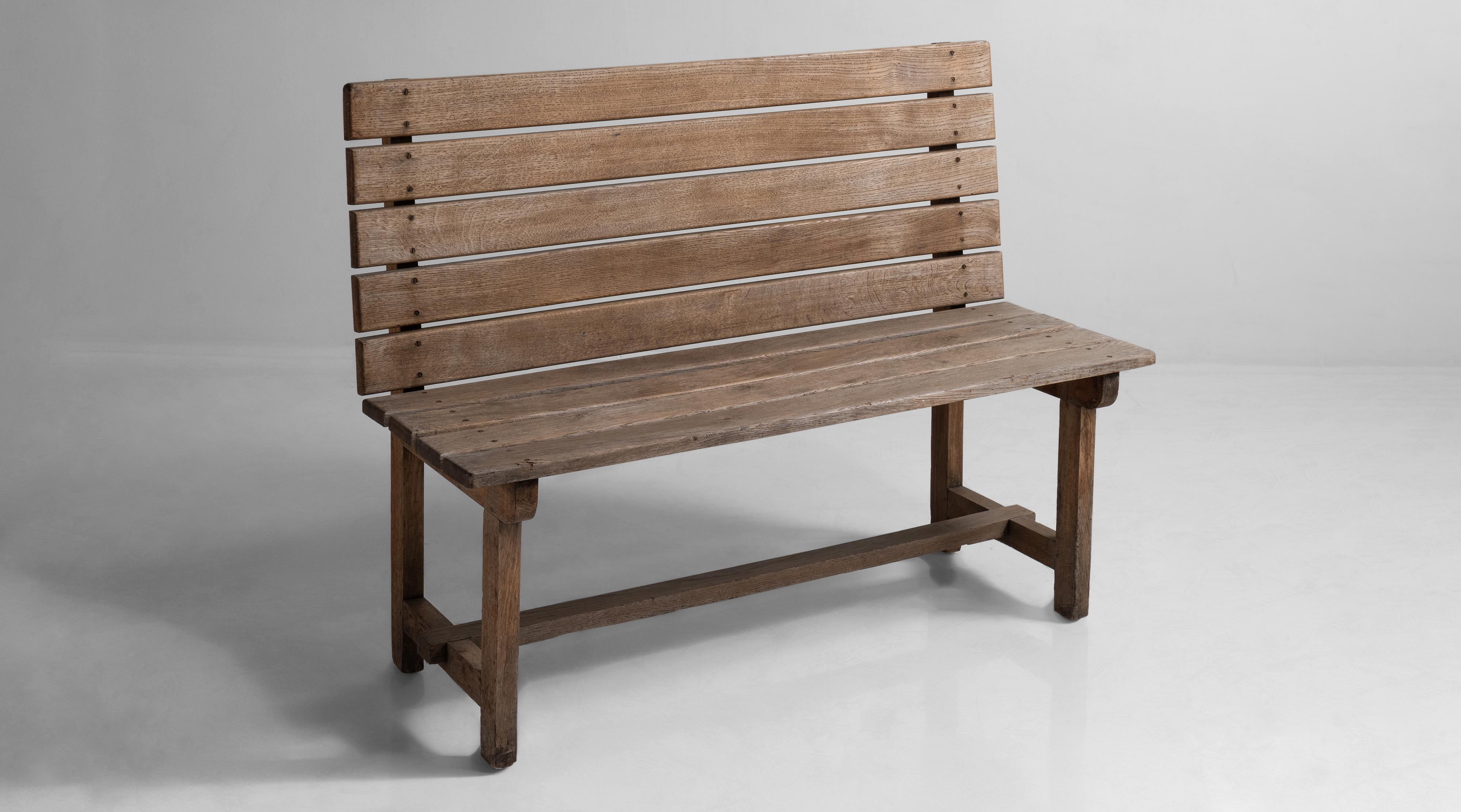Slatted oak back rest and seat on square legs.


Measures: 47.25” W x 17.75” D x 35