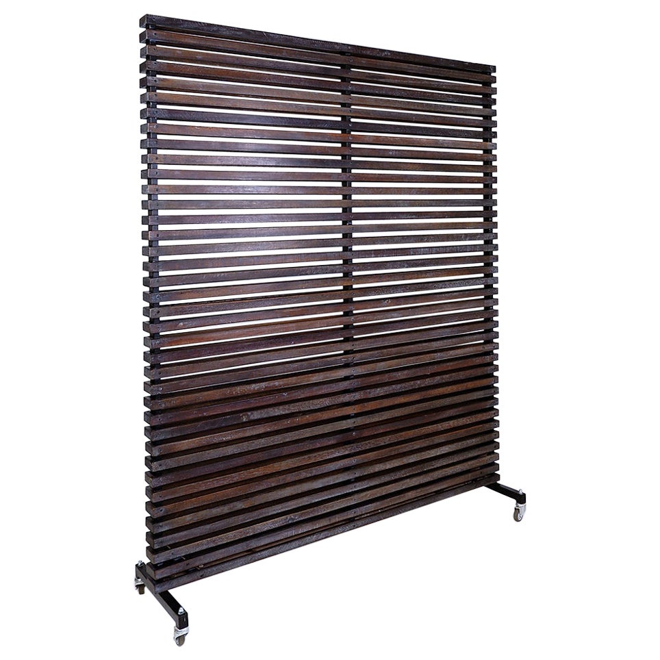 Slatted wood panel room divider or slatted coat rack with 10 mobile hooks - 20th For Sale