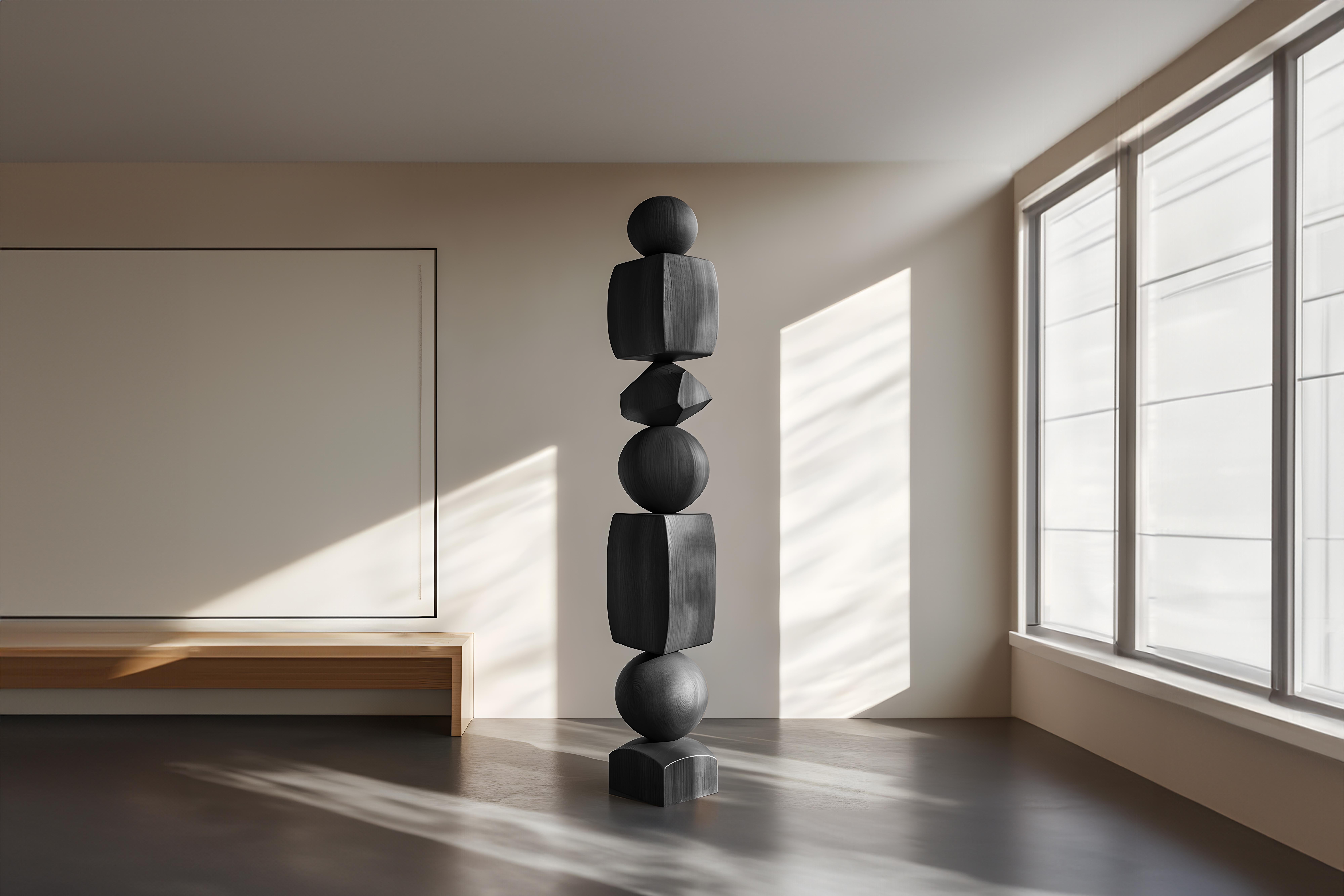 Sleek and Dark Design in Black Solid Wood Totem, Still Stand No87
——

Joel Escalona's wooden standing sculptures are objects of raw beauty and serene grace. Each one is a testament to the power of the material, with smooth curves that flow into one