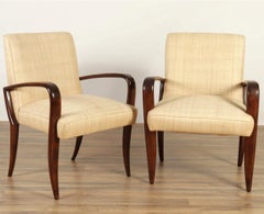 Sleek and Sinuous Dark Maple and Woven Raffia Art Deco Arm Chairs