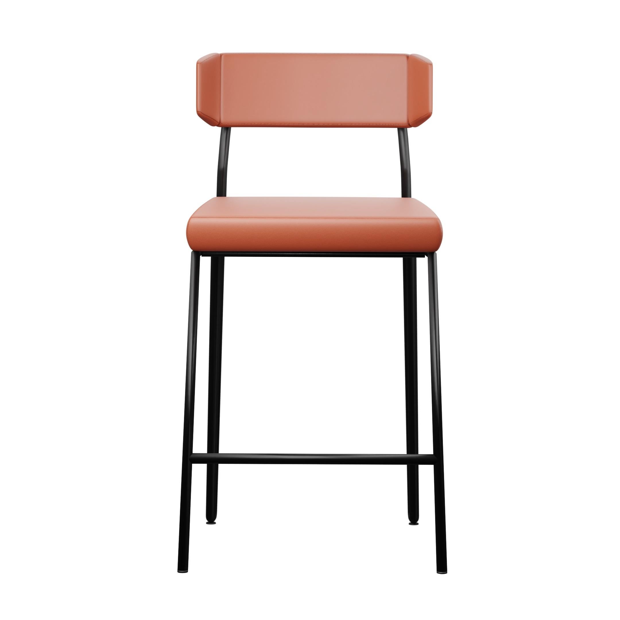 The Dih barstool is a versatile and customizable piece that seamlessly blends minimalist aesthetics with enduring quality. Its sleek, black iron frame, meticulously crafted by our skilled artisans, exudes both strength and durability. The genuine