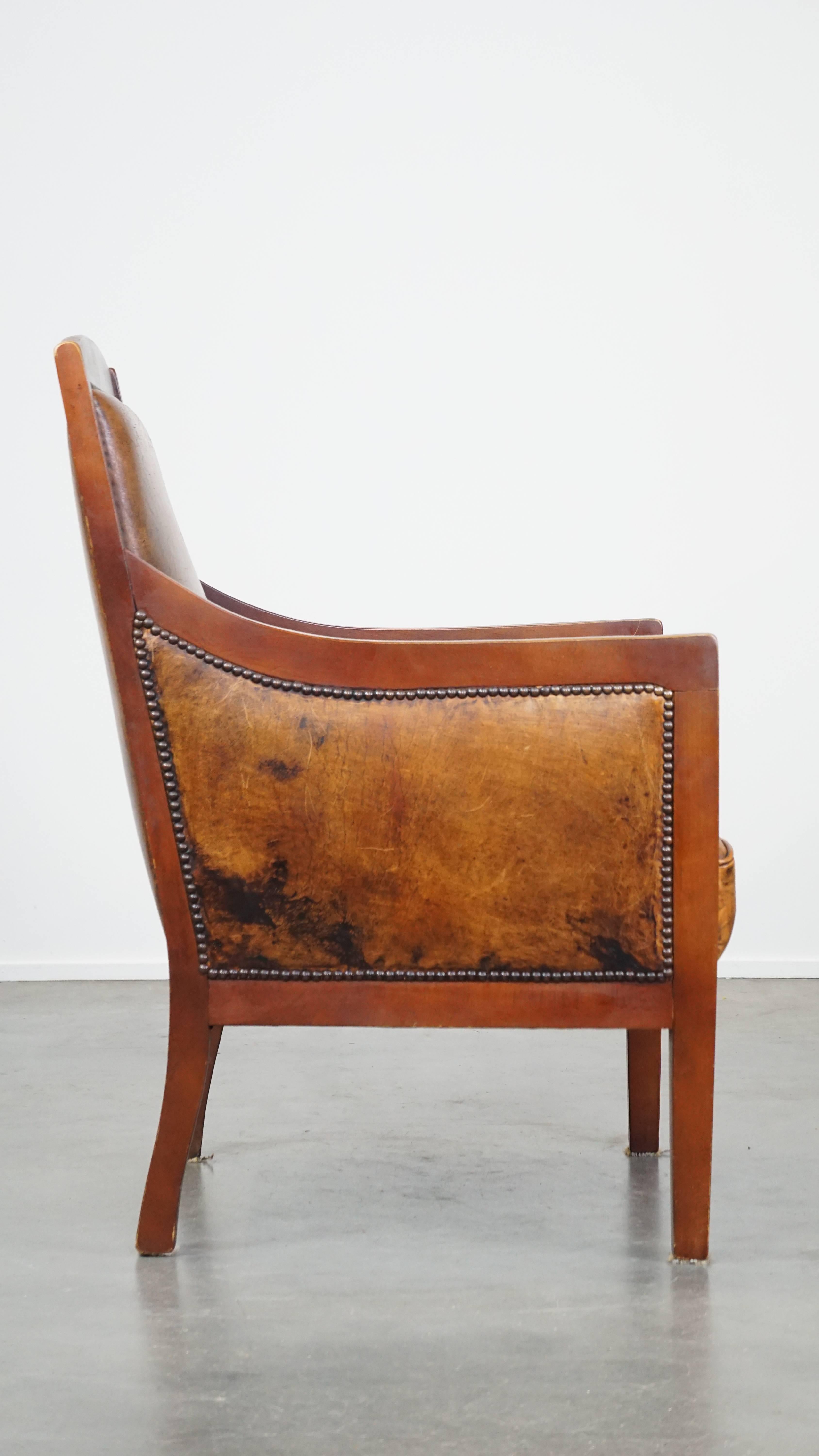 Hand-Crafted Sleek, beautiful sheepskin leather and wood vintage Art Deco design armchair For Sale