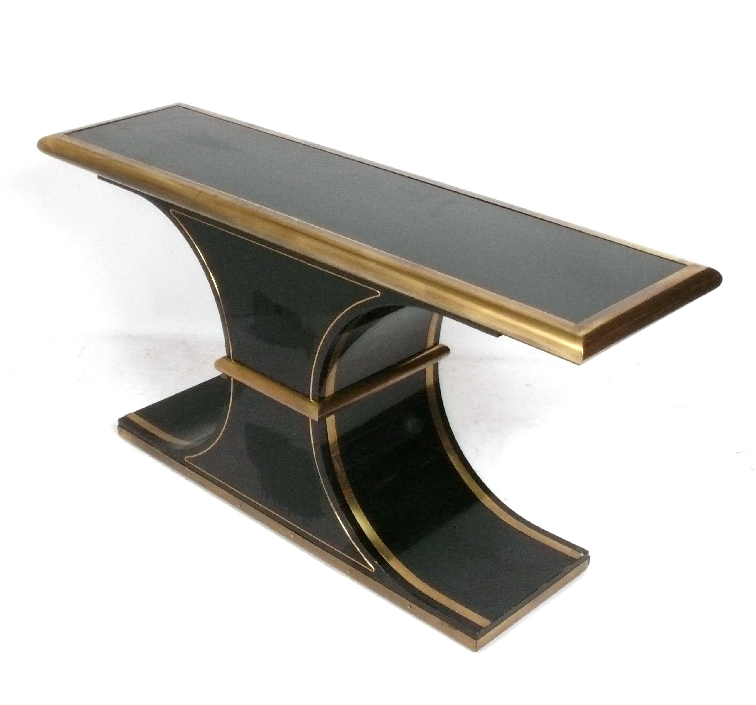Sculptural Console Table made by the Mastercraft Company, circa 1960s. It is a versatile size and would make a great console or sofa table. It would even make a fine bar, with it's durable, low maintenance surfaces.
