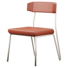 Sleek chair Dih with Coral leather handcrafted by Murmurio