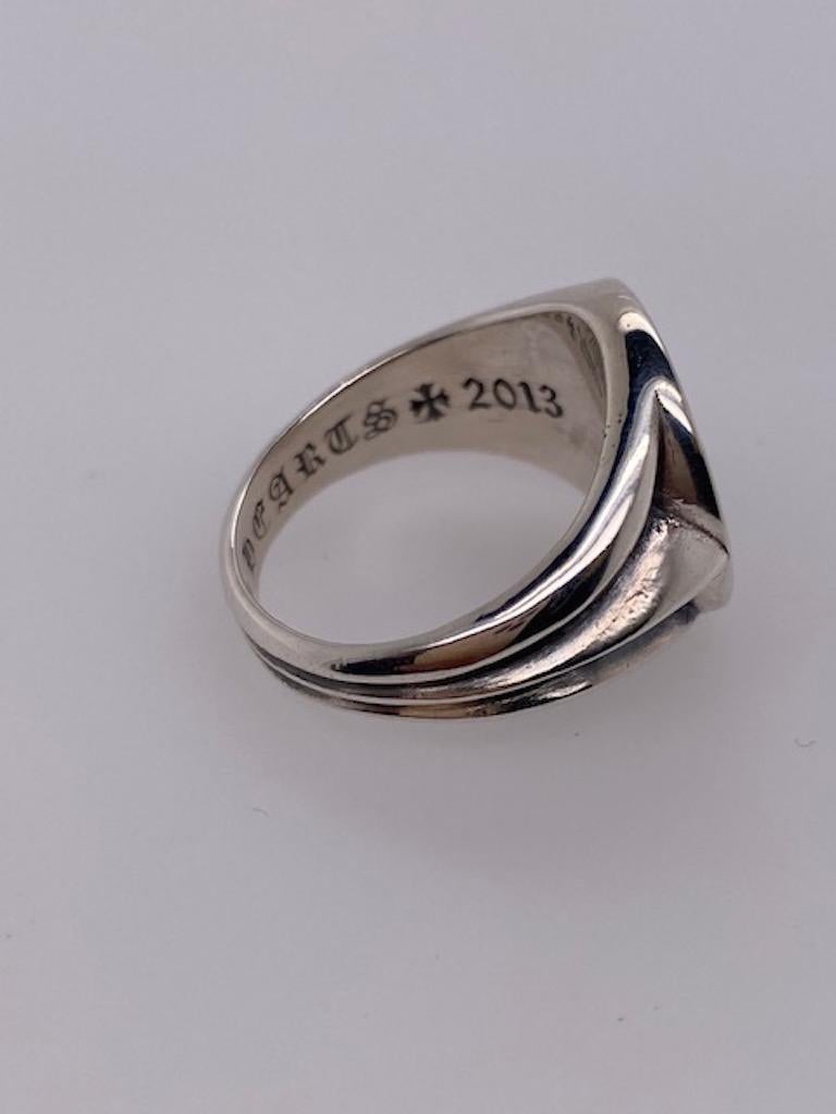 Sleek tapered crest ring.  Made and signed by CHROME HEARTS.  Sterling silver.  Size 9 1/2 and can be custom-sized.  Smoothly rounded.

Alice Kwartler has sold the finest antique gold and diamond jewelry and silver for over forty years.