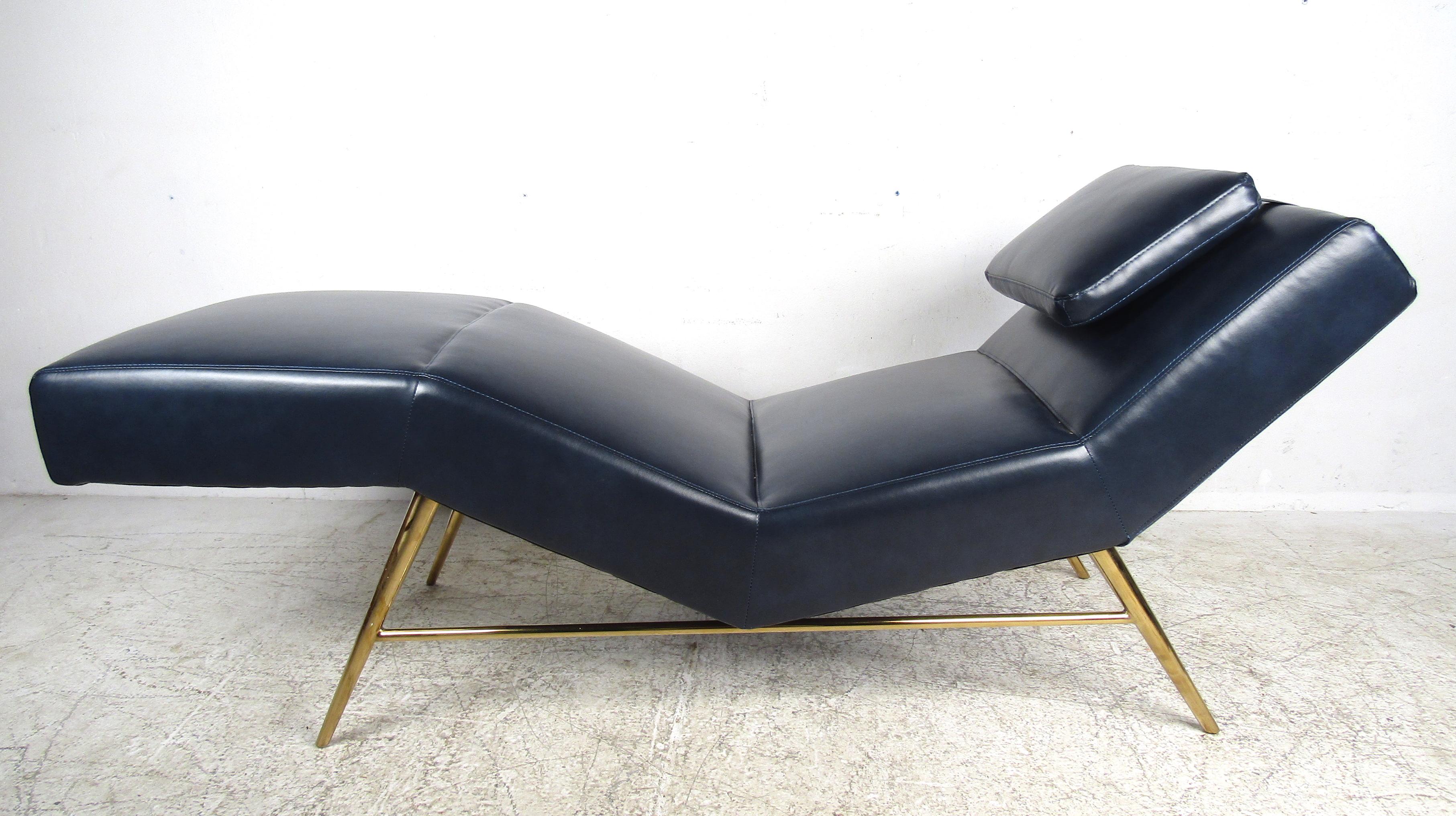 This stunning midcentury style Italian daybed features an overstuffed pillow for your head and perfectly placed contours for the body. This lounge chair offers optimal comfort without sacrificing style. The unusual brass frame with splayed legs and