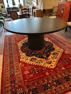 Sleek Ebonized Oak Round Dining Table with Columnar Base