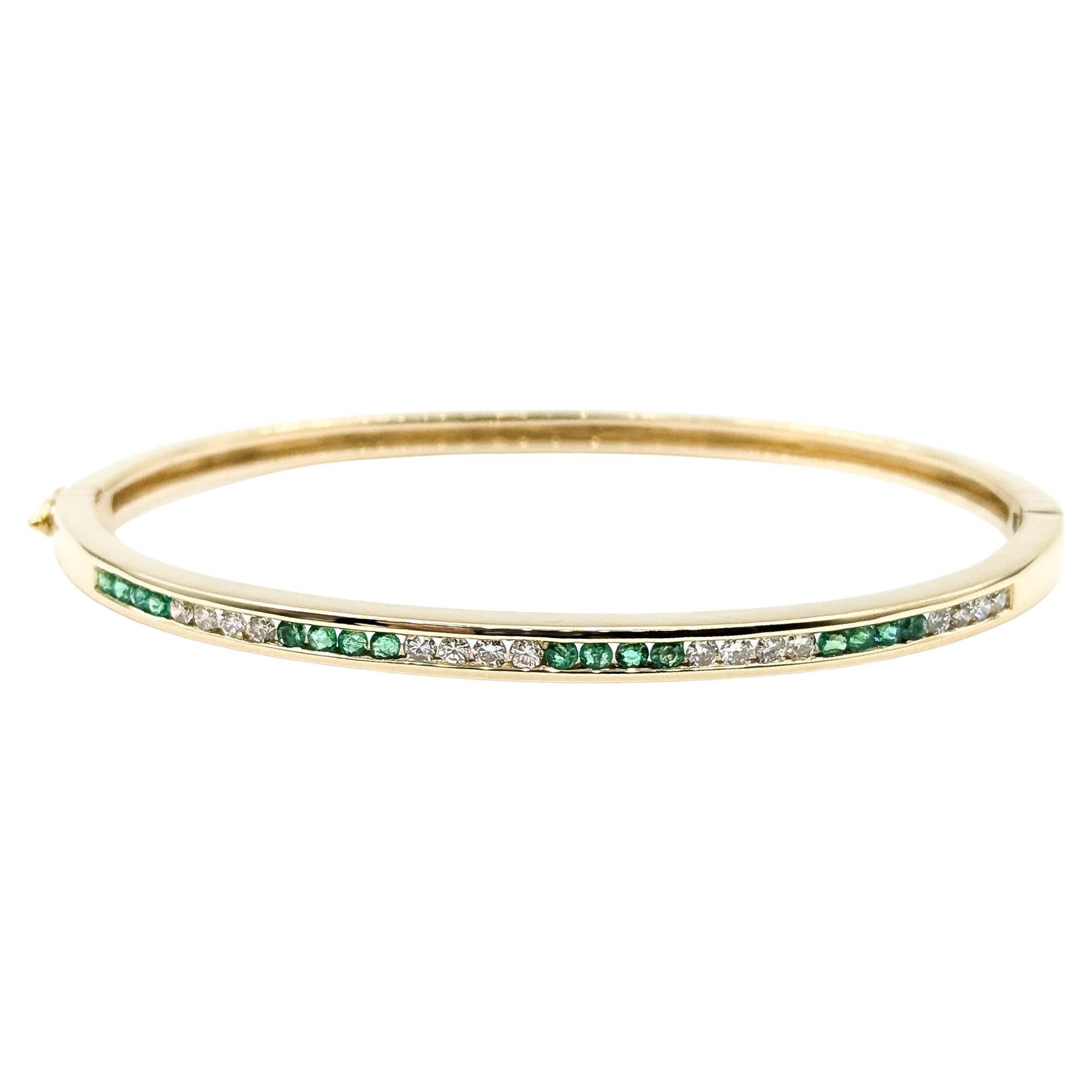 Bracelet élégant en or jaune 14k avec émeraudes et diamants