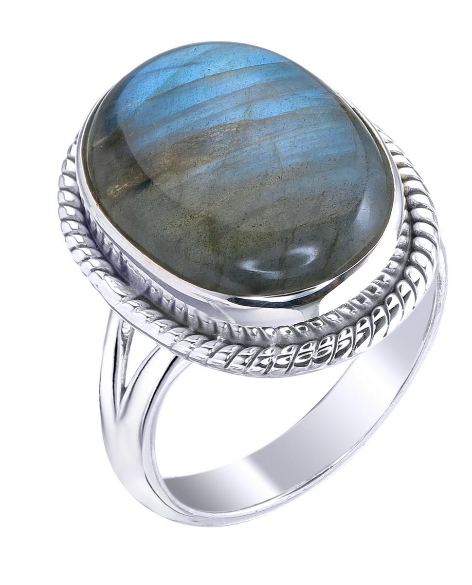 Beautiful cabochon Labradorite set in 925 Sterling Silver.
At the heart of this ring lies the enchanting labradorite gemstone, renowned for its ethereal play of colors that dance and shimmer with every movement. 
Encircling the gem sits a strong
