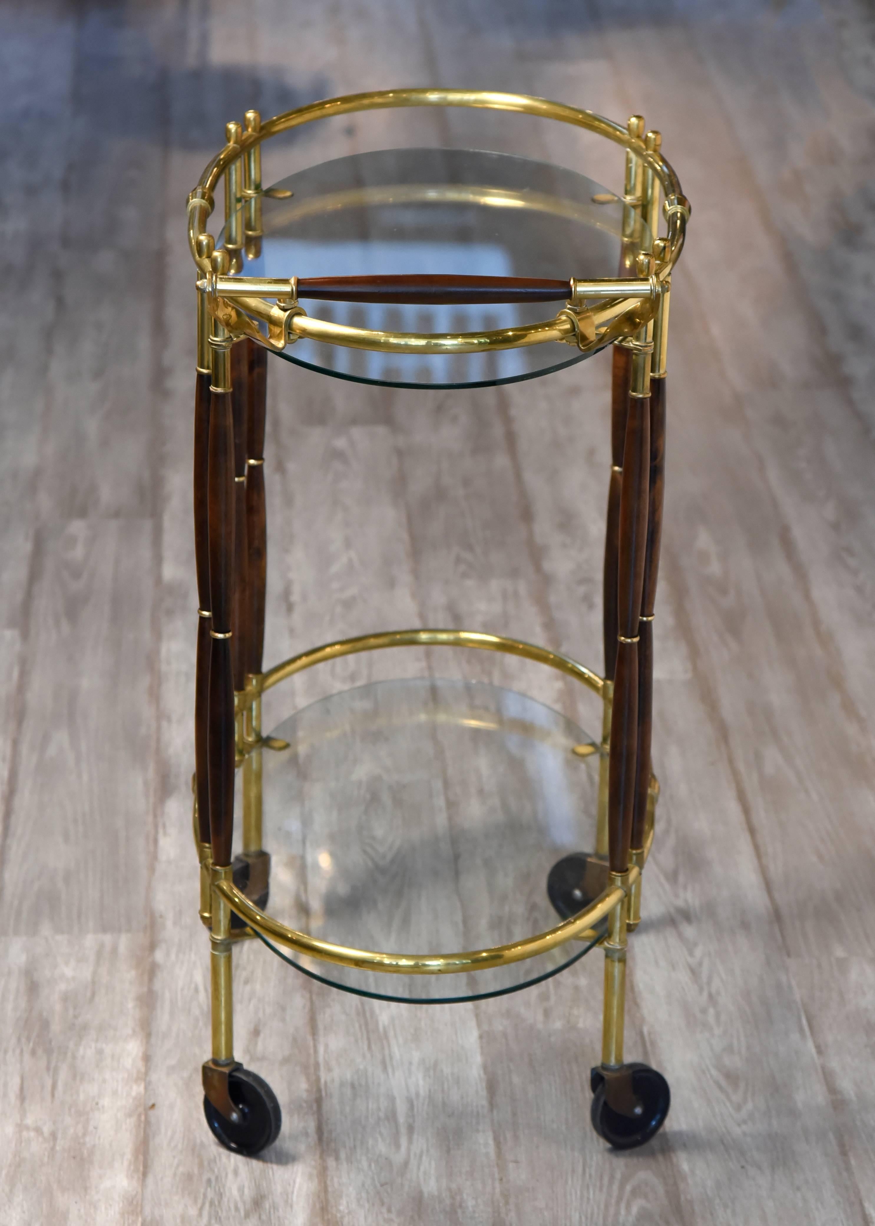 Sleek Mid-Century Modern Brass, Walnut and Glass Oval Bar Cart In Excellent Condition In Hopewell, NJ