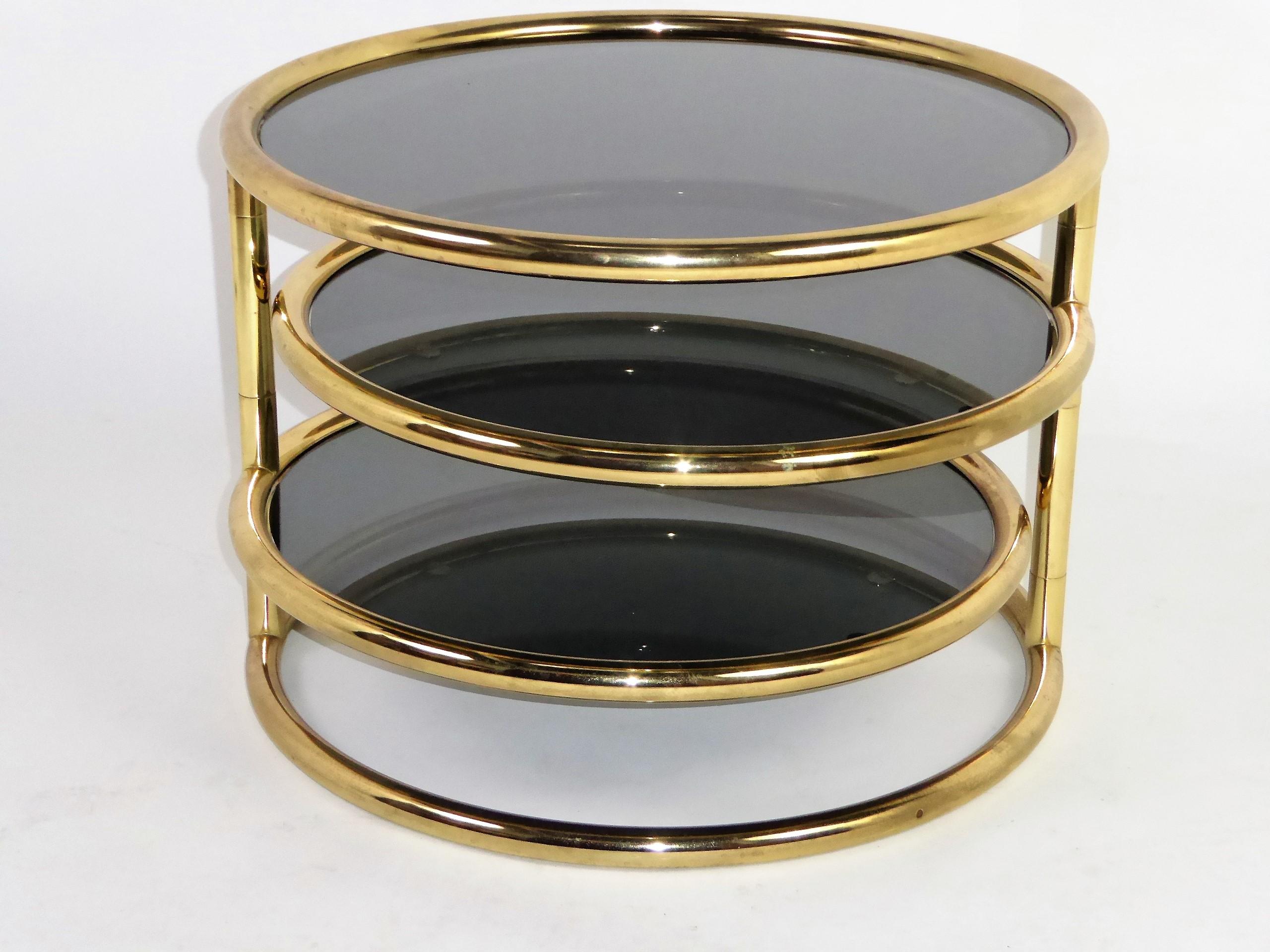 American Sleek Milo Baughman Style Brass and Glass Swiveling Coffee Table