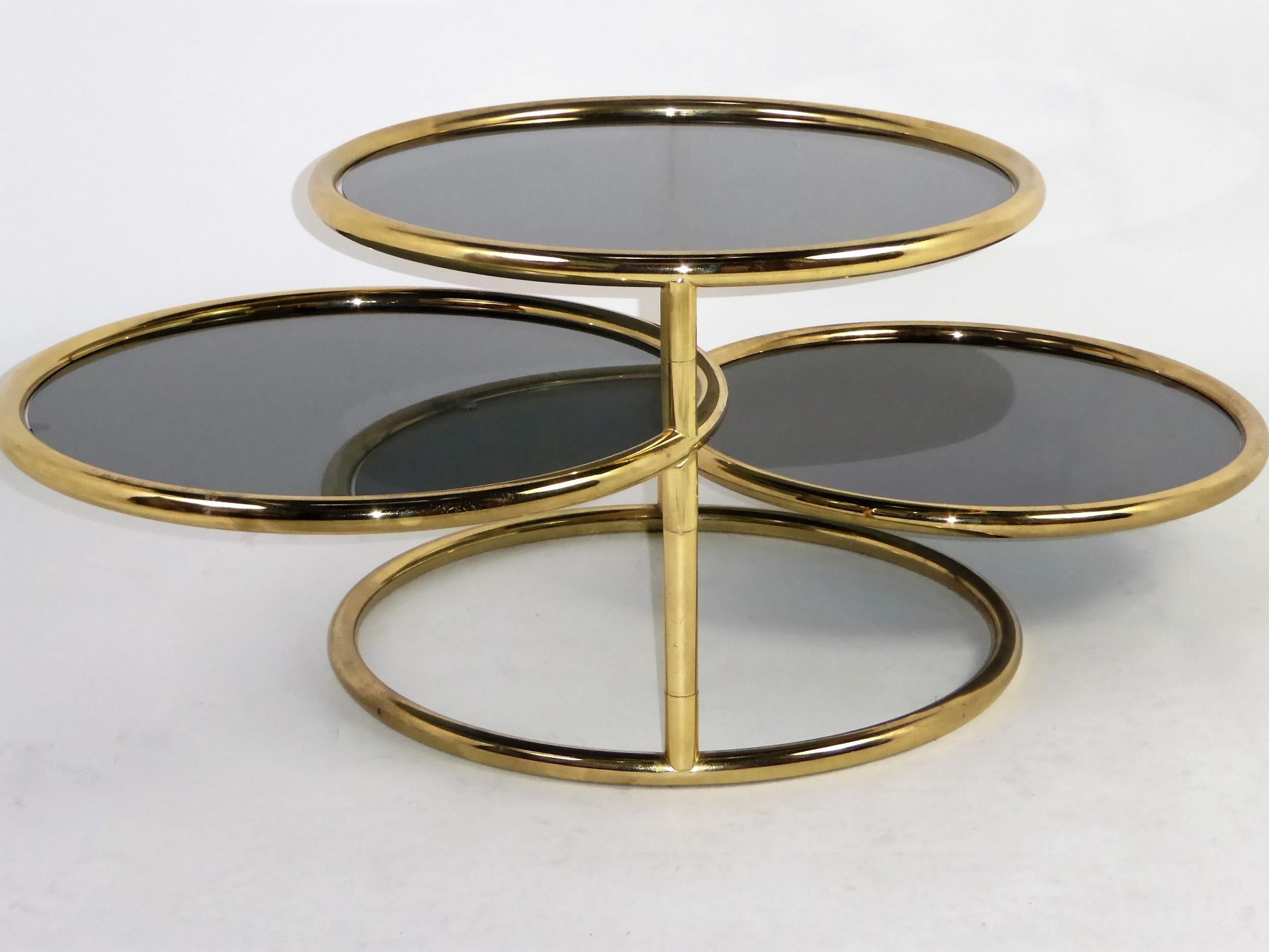 Sleek Milo Baughman Style Brass and Glass Swiveling Coffee Table In Good Condition In Miami, FL