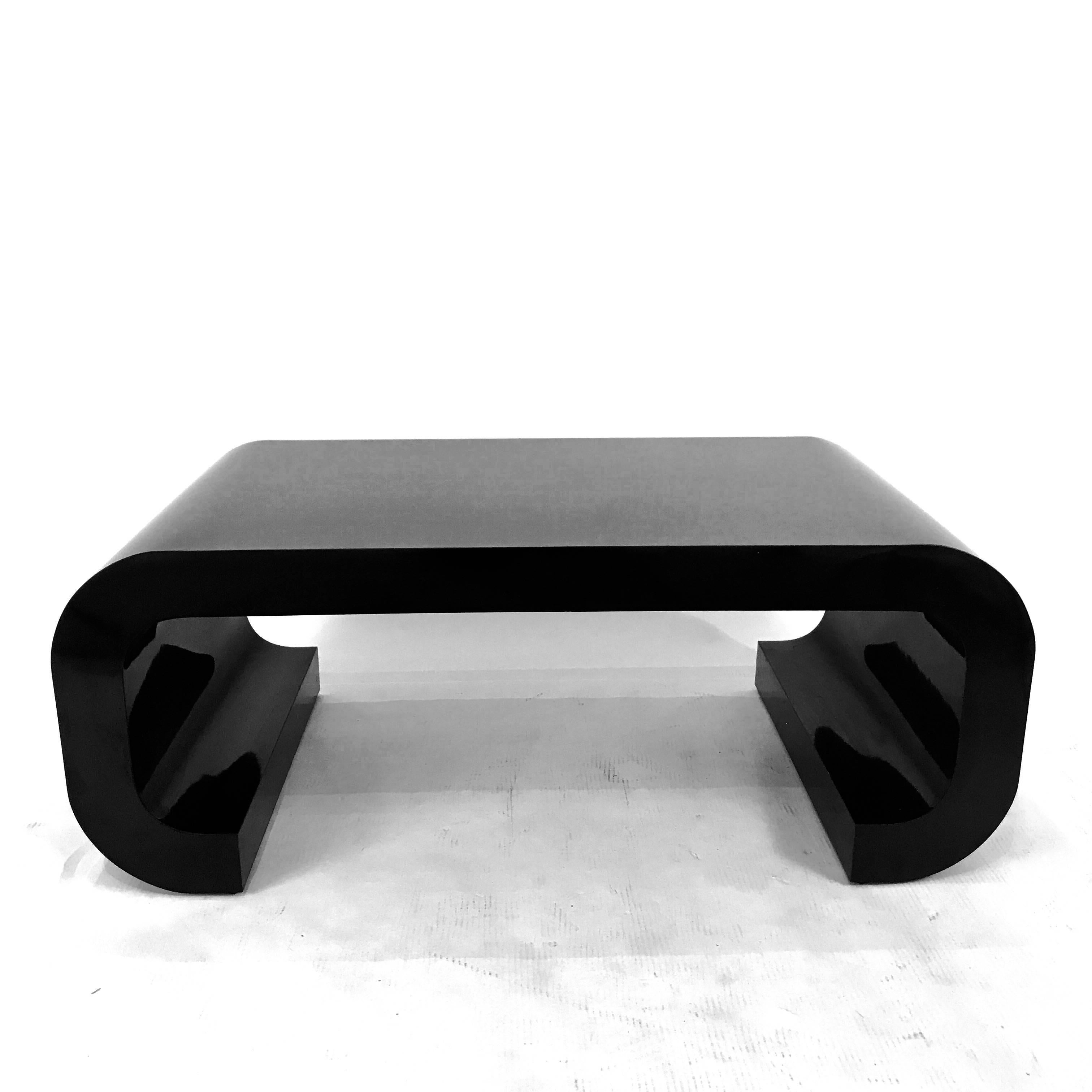 black curved coffee table