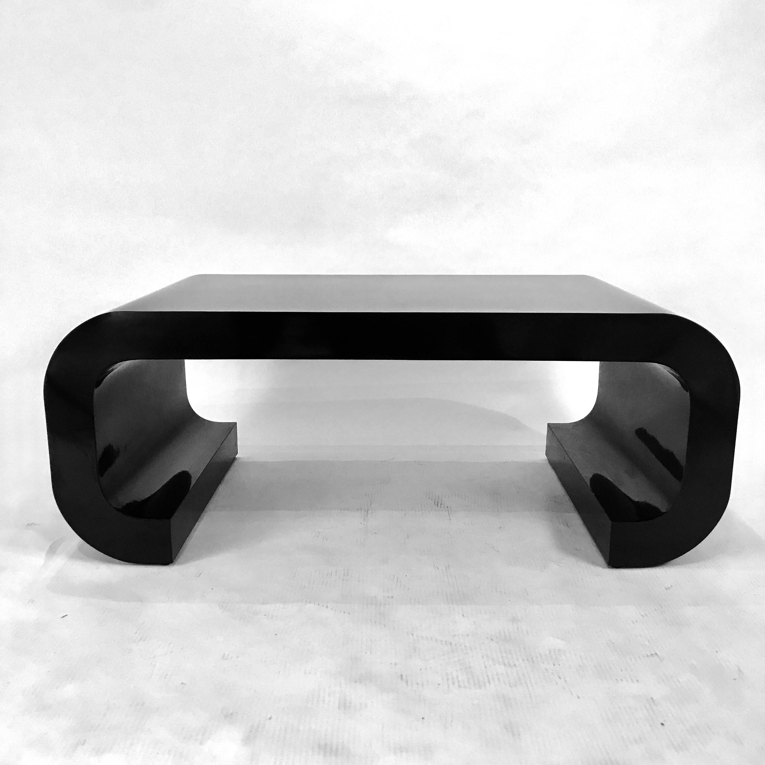 curved black coffee table