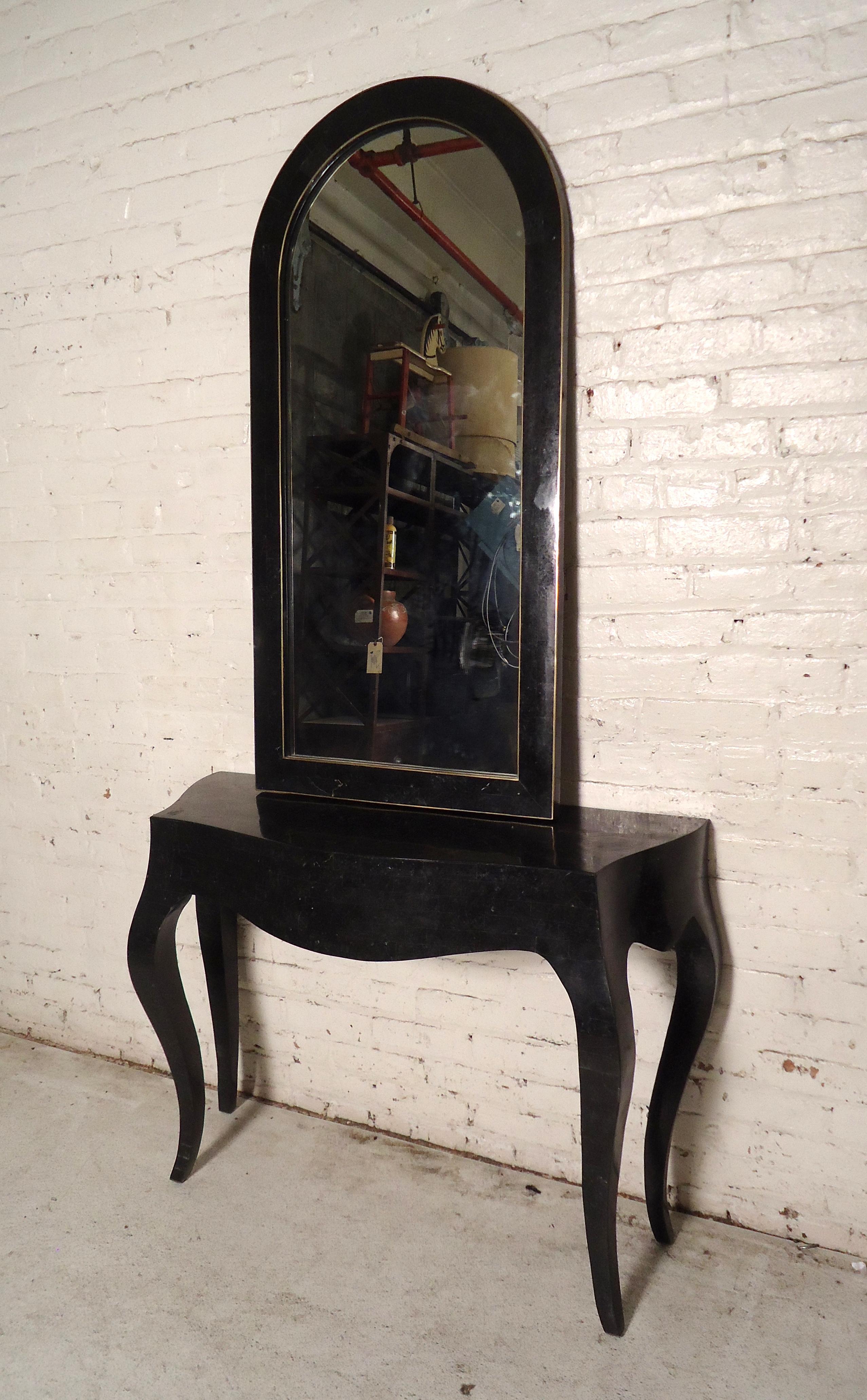 Vintage modern stone console and mirror, this set would make a great match for any entry way or foyer.
The nicely sculpted base and oval top mirror make this set unique.
Mirror dimensions: 48 H x 23.5 W x 1 D.

Please confirm item location NY or