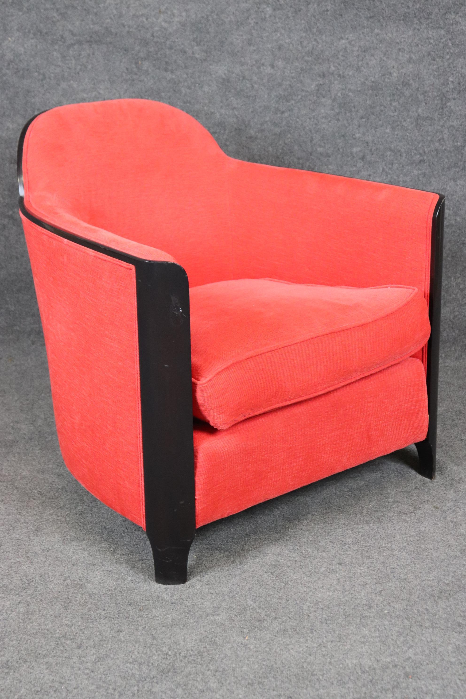 This is a superb pair of recently upholstered 1930-40s era French Art deco club chairs in ebonized lacquer frames. The chairs are in good antique condition with minor scuffs to teh legs from vacuum cleaner bumpers and otherwise clean. The chairs