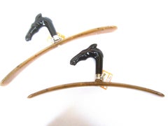Sleek Pair of Italian Molded Resin Stylized Equine Clothing Hangers circa 21st