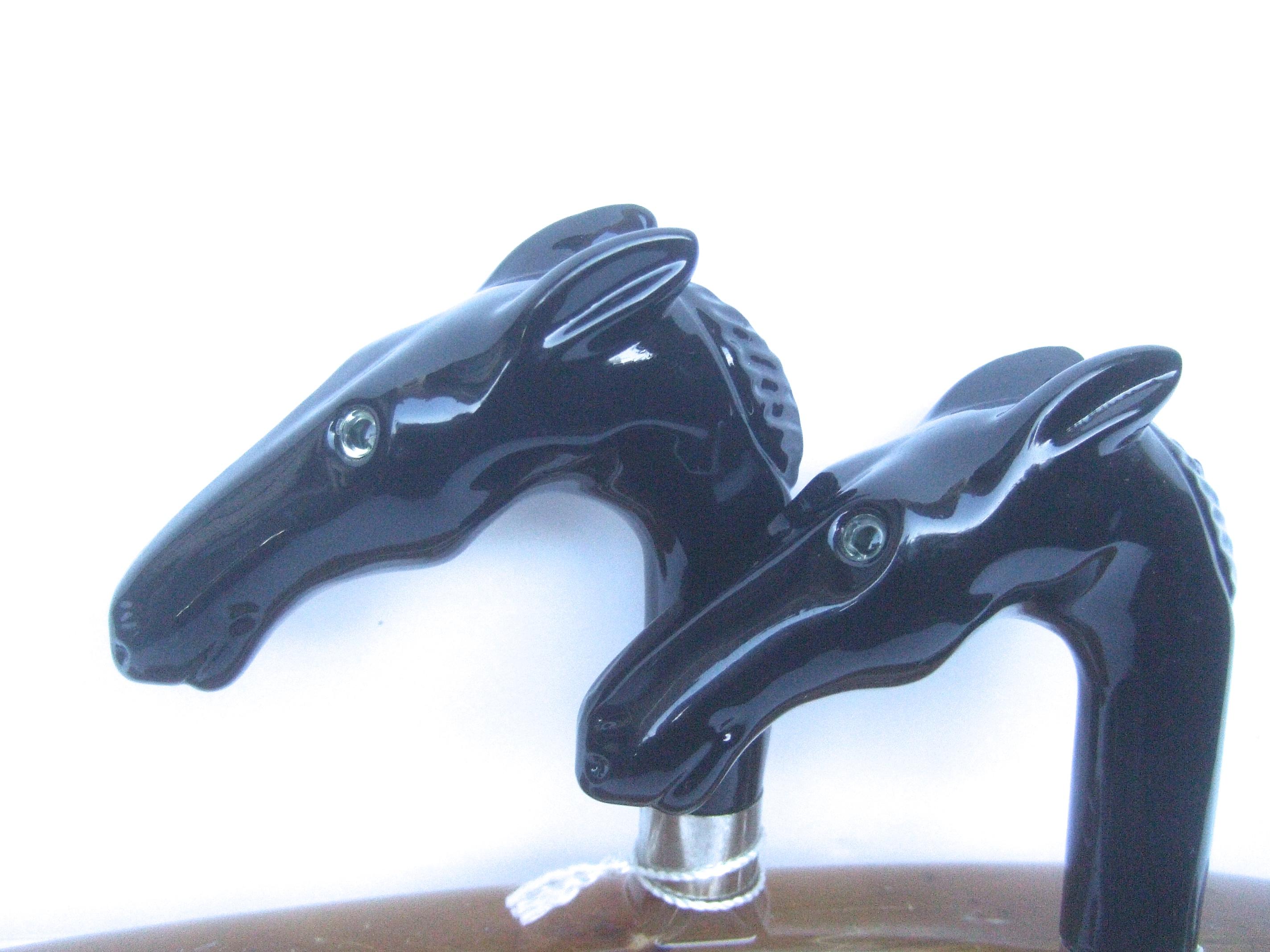 Brown Sleek Pair of Italian Molded Resin Stylized Equine Clothing Hangers circa 21st   For Sale