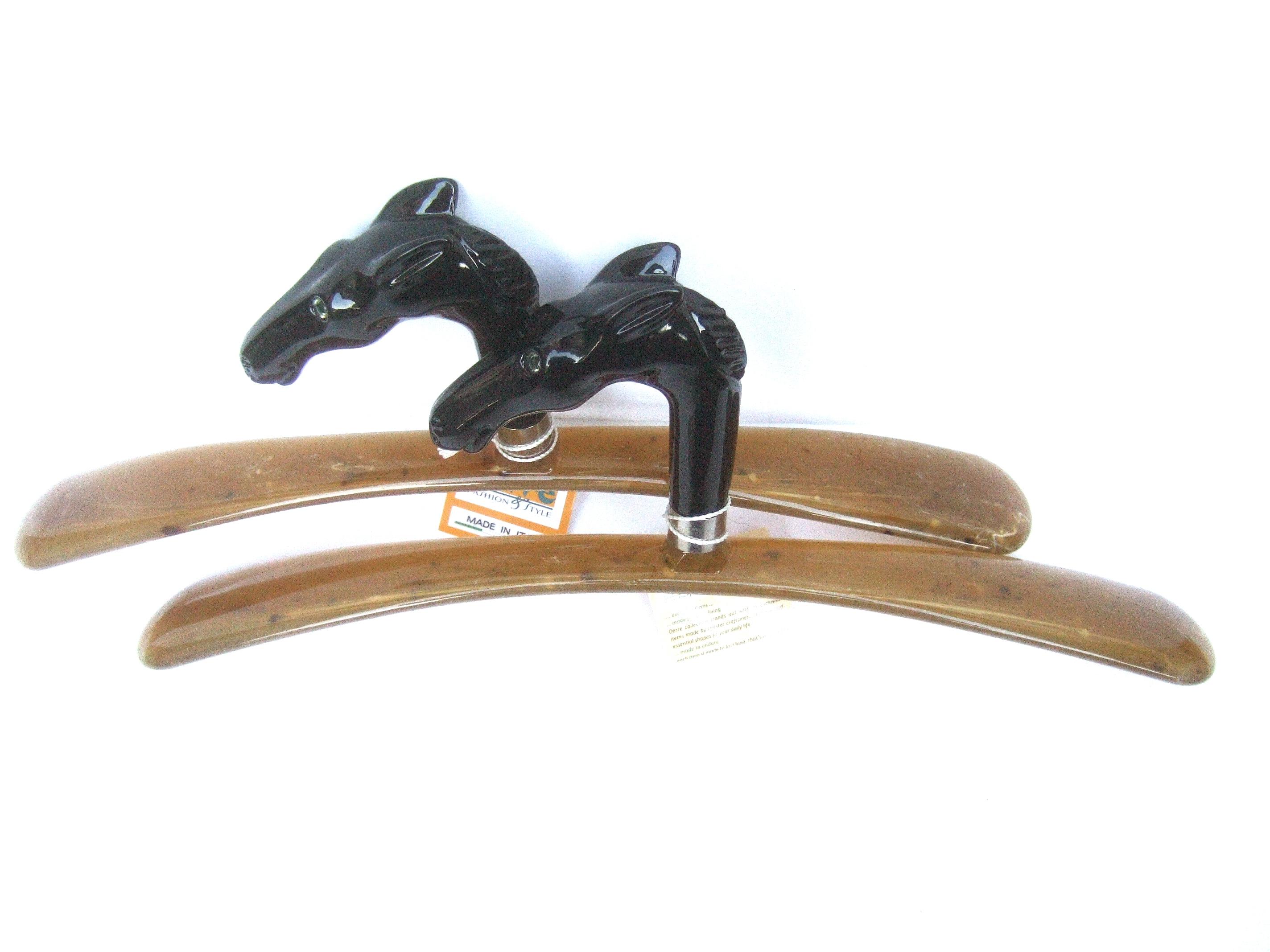 Sleek Pair of Italian Molded Resin Stylized Equine Clothing Hangers circa 21st 2