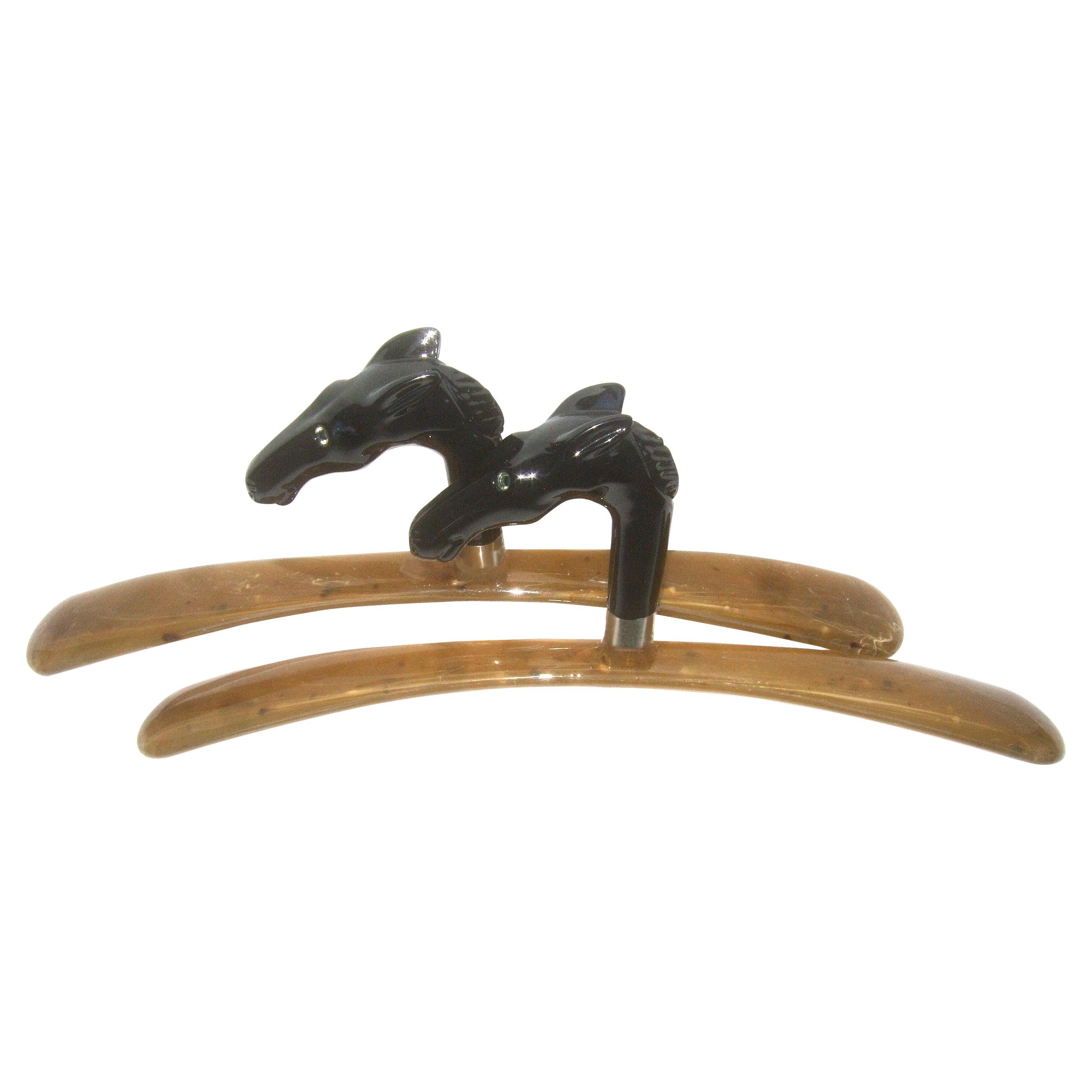 Sleek Pair of Italian Molded Resin Stylized Equine Clothing Hangers circa 21st   For Sale
