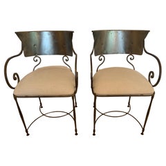 Sleek Pair of Sophisticated Metal Sculpted Armchairs