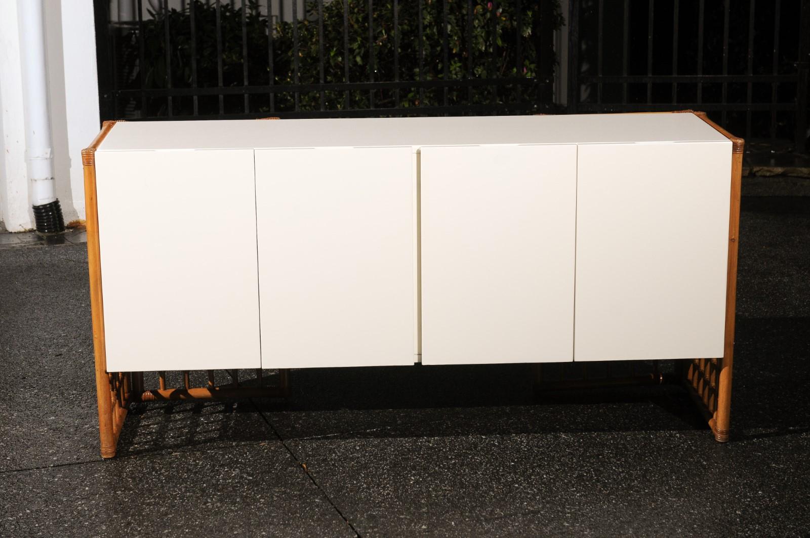 Sleek Restored Cream Lacquer Cabinet with Rattan and Cane Accents, circa 1975 In Excellent Condition For Sale In Atlanta, GA