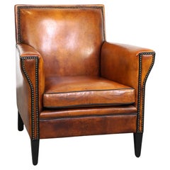 Sleek sheepskin Art Deco design armchair with beautiful details