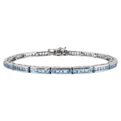 Sleek Sterling Silver Blue Topaz Gemstone Tennis Bracelet for Women