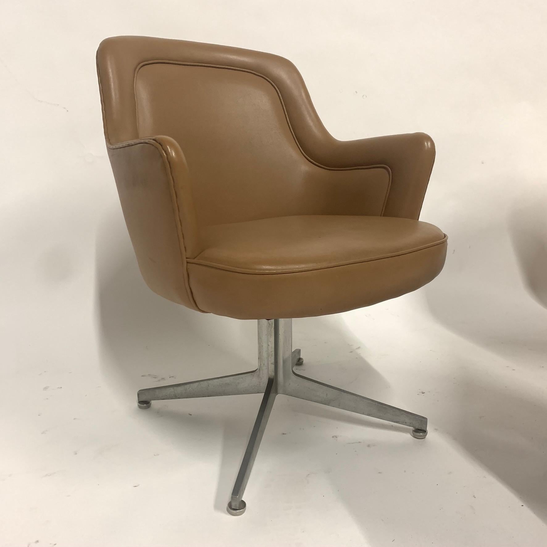Ward Bennett amazingly sleek designed office chair on aluminium star base. 3 available. All good condition with the exception of the naugahyde upholstery. All have some small tears and nicks in naugahyde here and there. Could be used as is, but good