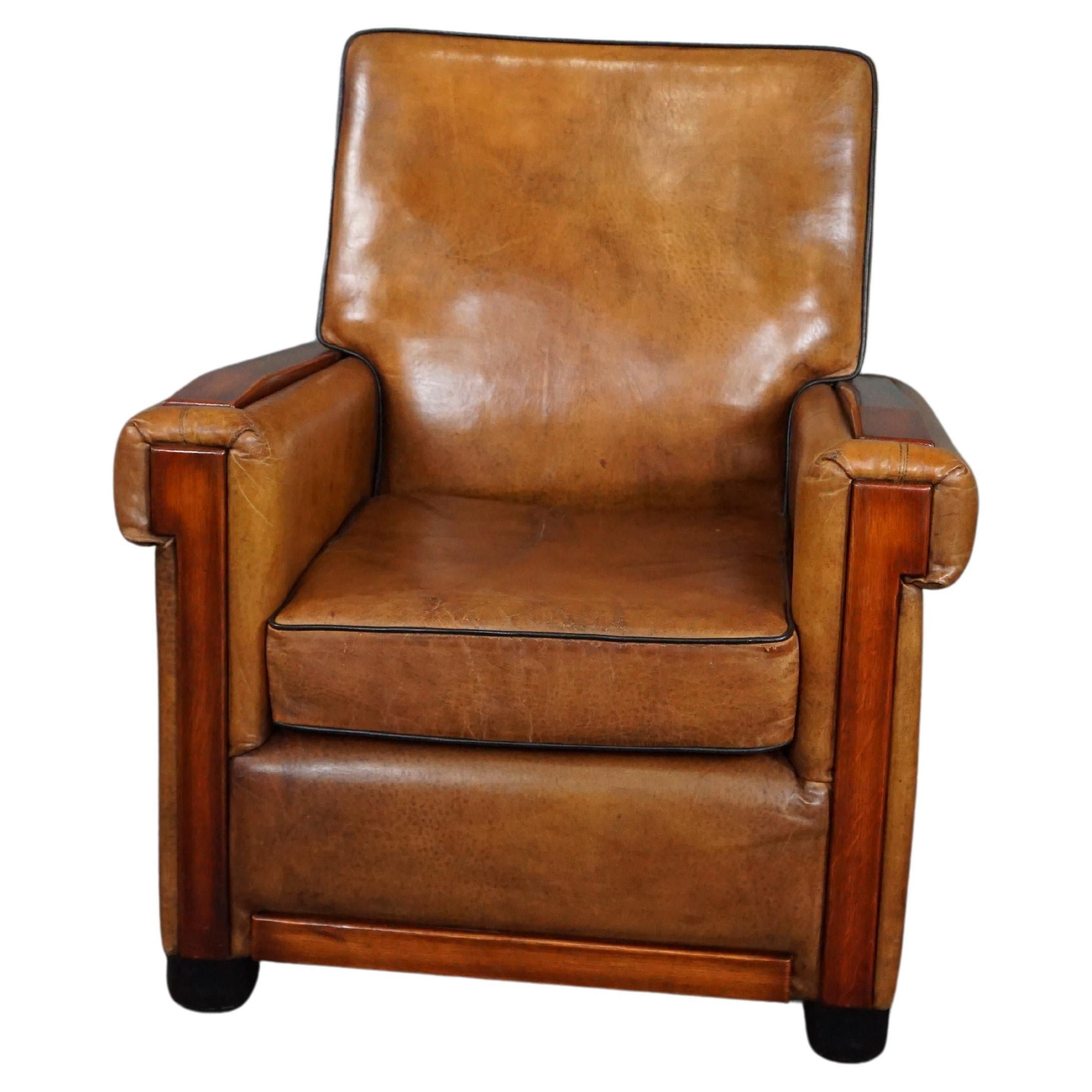 Sleekly designed sheepskin Art Deco design armchair