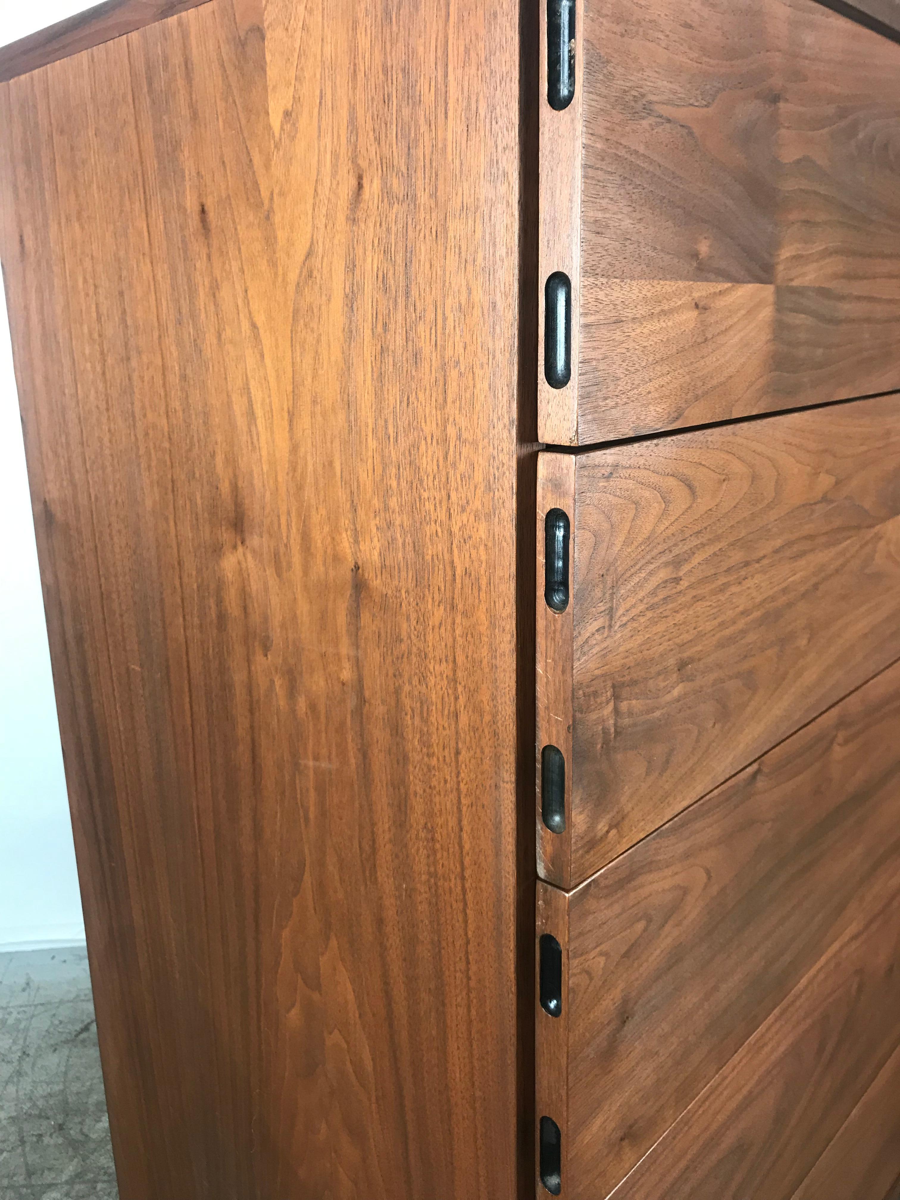 Sleek, simple, elegant Mid-Century Modern custom designed and built gentleman's chest or dresser, features beautiful walnut wood, unusual side pulls which enhances design, 5 generous drawers (left), cubby storage (right) with top trinket drawer,