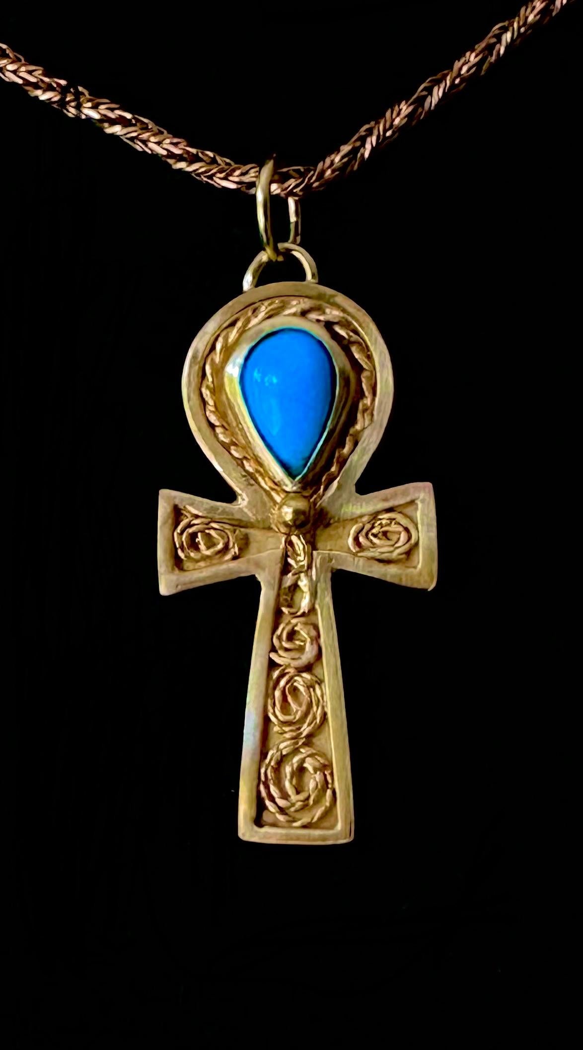 -Available
-Handmade
-One of a kind 
-22K Gold Filigree wire
-18K Gold Frame
- Sleeping Beauty Turquoise 
 -Stamped with the Nebu logo
-This is sold as the Pendant only.

Ankh…or the Key of Life

A symbol of eternity in ancient Egypt.

This pendant