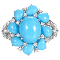 Bague en or blanc 18 carats avec turquoise de la mine Sleeping Beauty et diamants en grappe