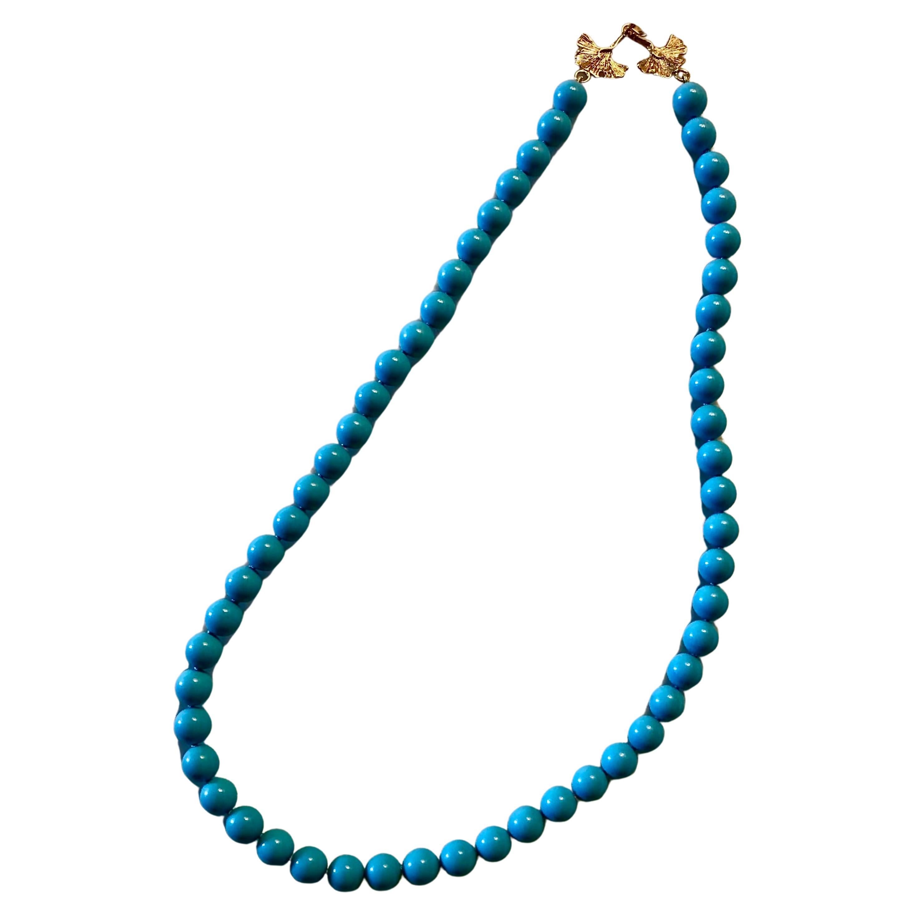 Sleeping beauty turquoise beads with 14kt gold clasp For Sale