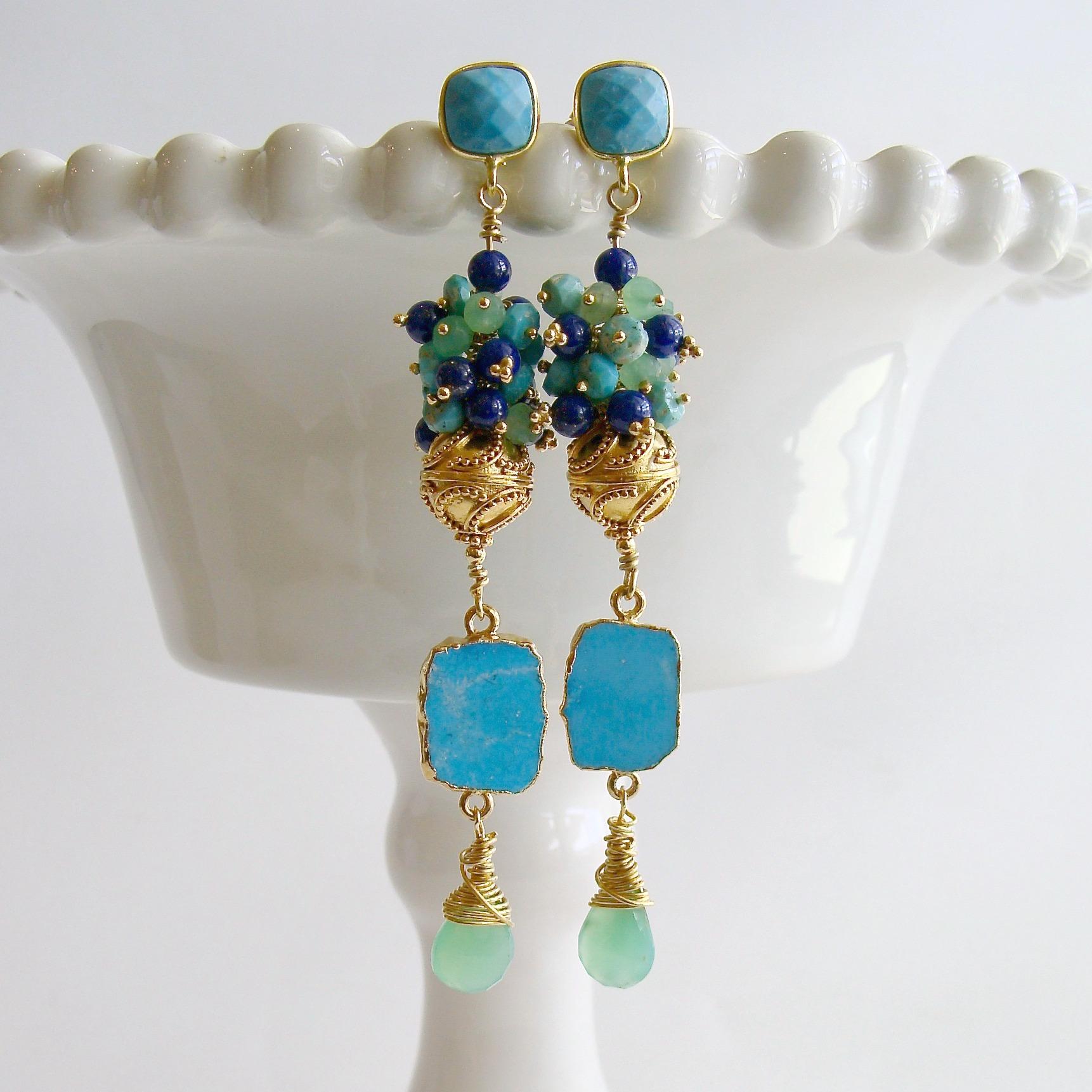 Morgaine II Duster Earrings.

A generous cluster of turquoise, spring green and royal blue rondelles consisting of Sleeping Beauty Turquoise, chrysoprase and lapis lazuli - crowns a swirled gold vermeil bead, while coveted Sleeping Beauty Turquoise