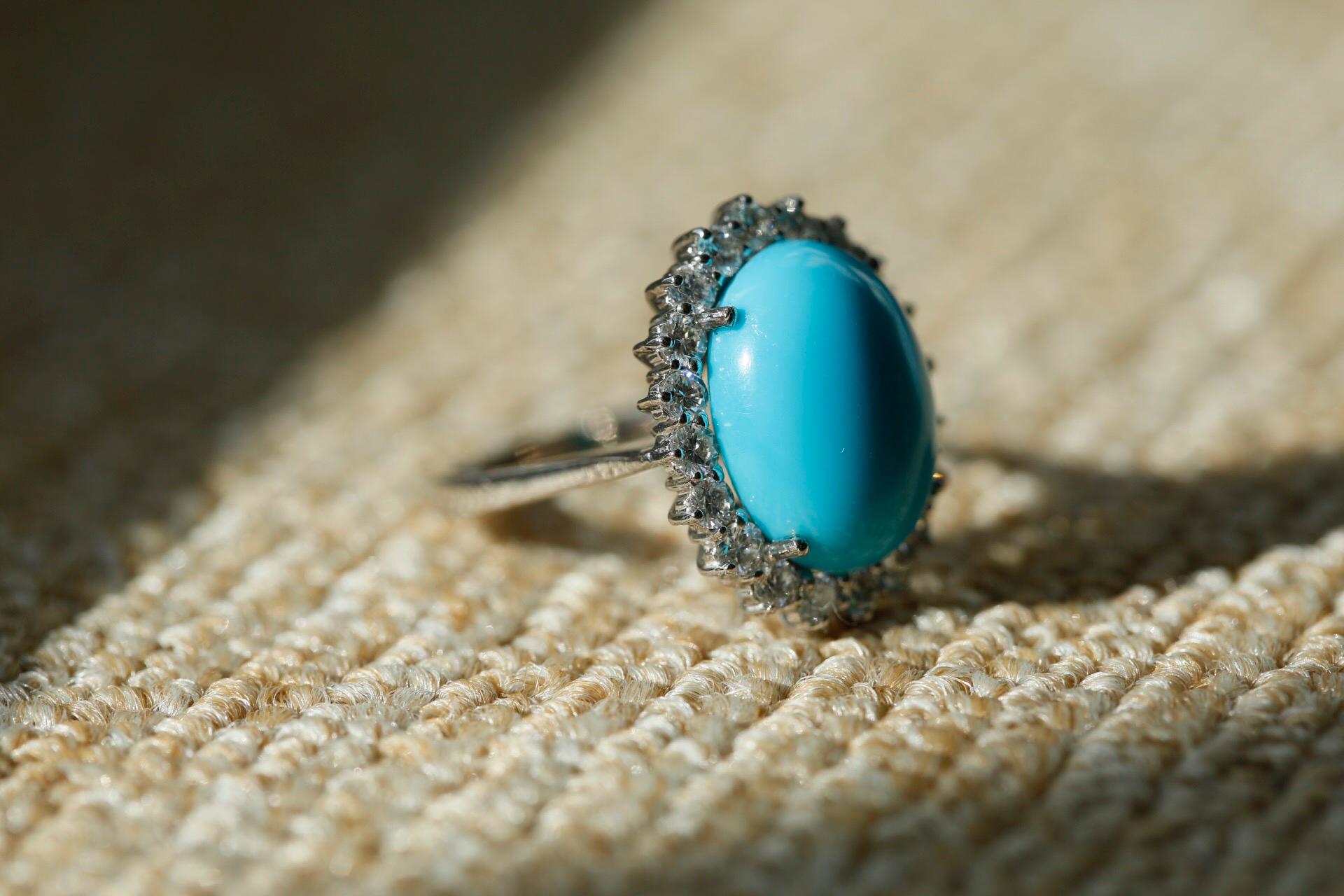 Oval Cut Sleeping Beauty Turquoise Diamond 18 Karat White Gold Ring