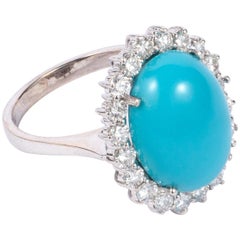 Bague "Belle au bois dormant" en or blanc 18 carats avec turquoise et diamant