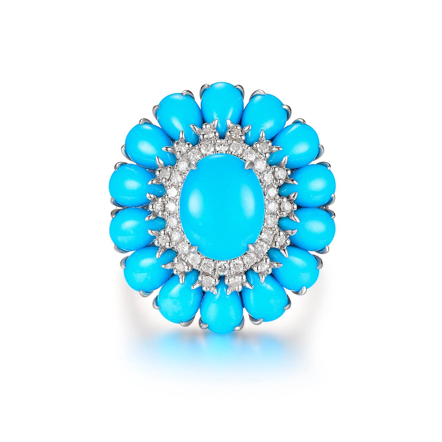 This turquoise ring features 8.56 carats of sleeping beauty mine turquoise. Sleeping Beauty Mine. Famous for it solid, light blue color with no matrix. Assented with 0.26 carat of white round diamonds. Ring is set in 14 karat gold. Matching earrings