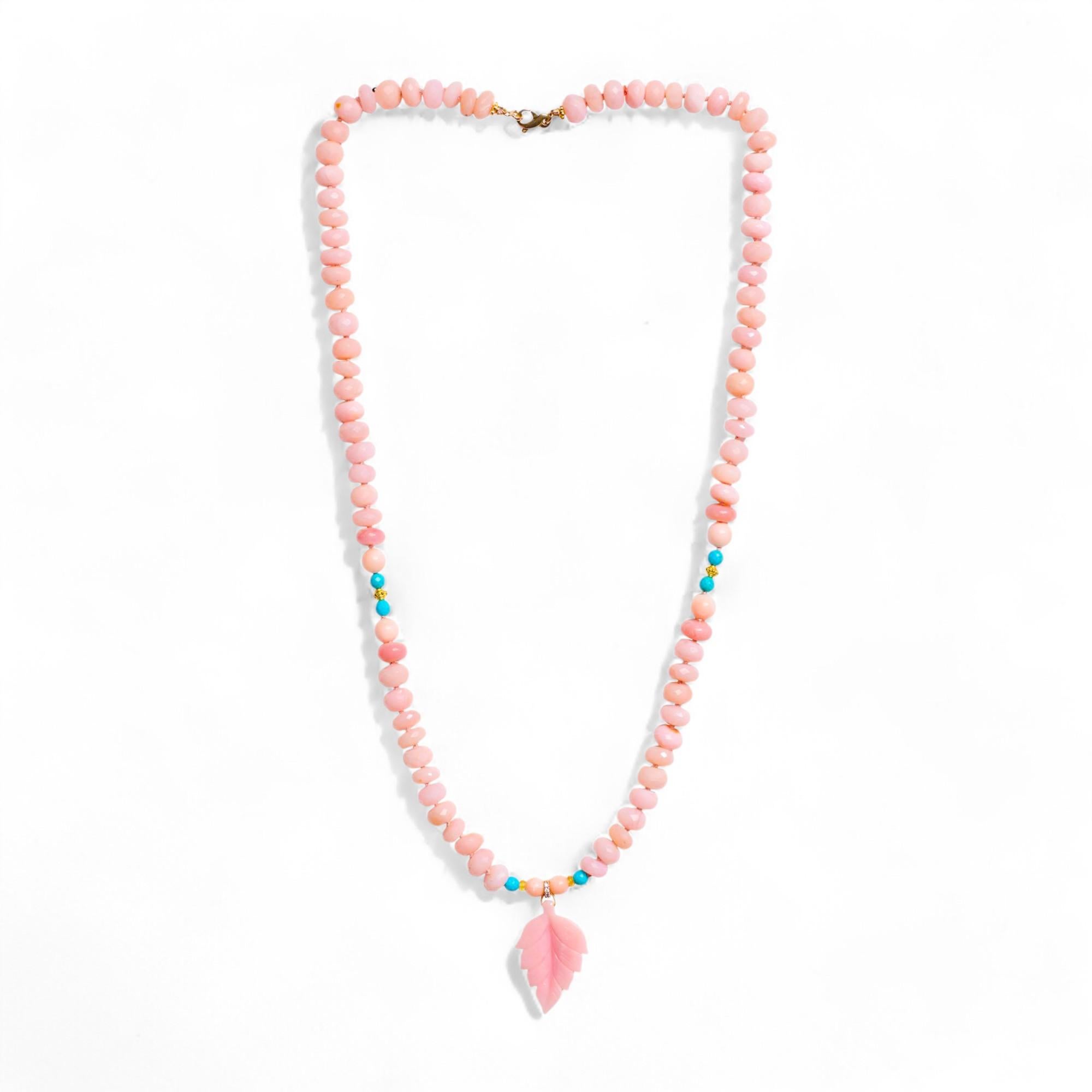 Adorn yourself with this unique pink opal charm necklace. A sparkling pink Peruvian opal necklace that exudes true beauty and sophistication. It is elevated to the next level with sparkling diamonds, mysterious and extremely rare padparadscha