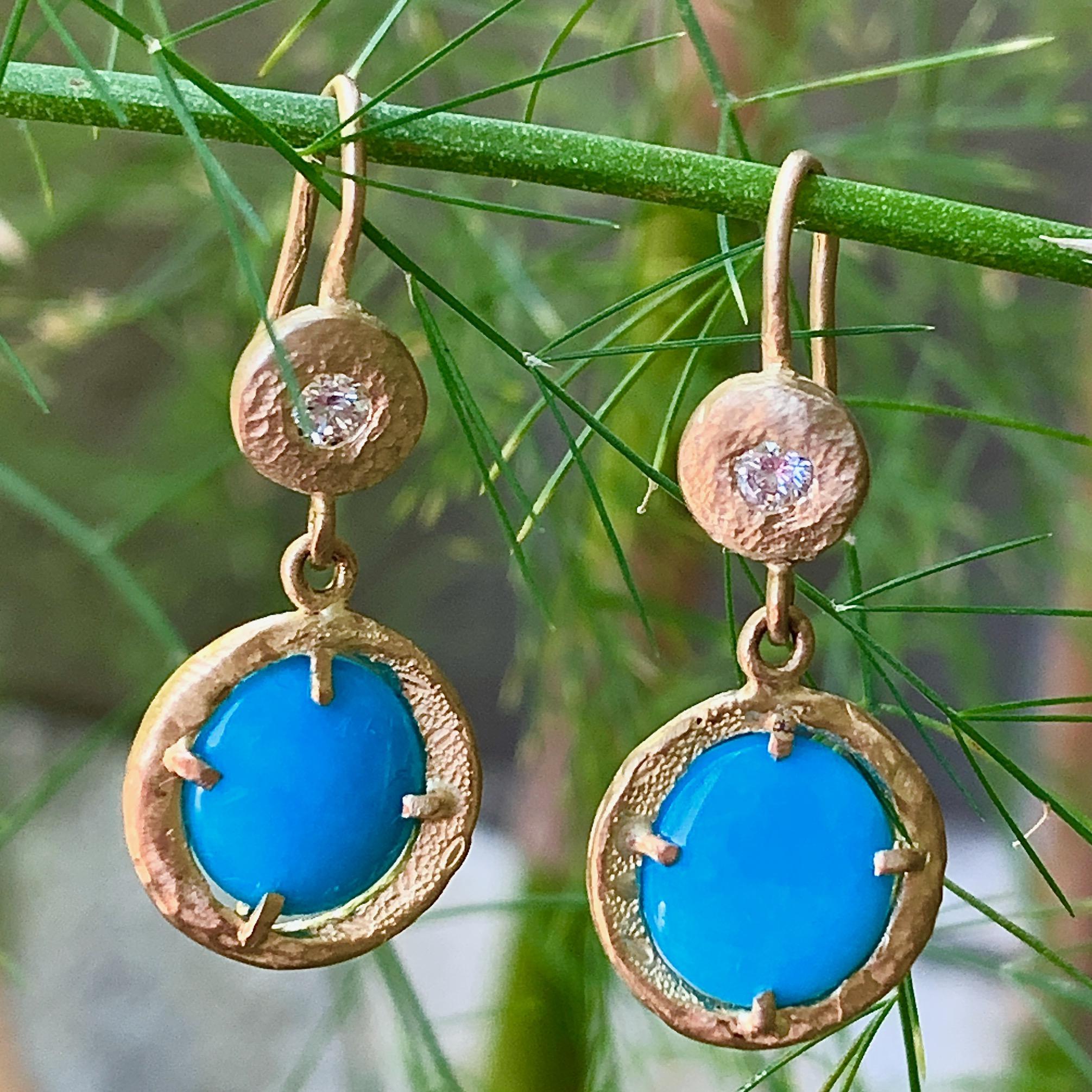 These one-of-a-kind earrings by Eytan Brandes feature two discs of turquoise from the Sleeping Beauty mine in Globe Arizona.  Eytan bought a large rough stone of this stuff a few years before the mine closed down.  He was using it up quickly,