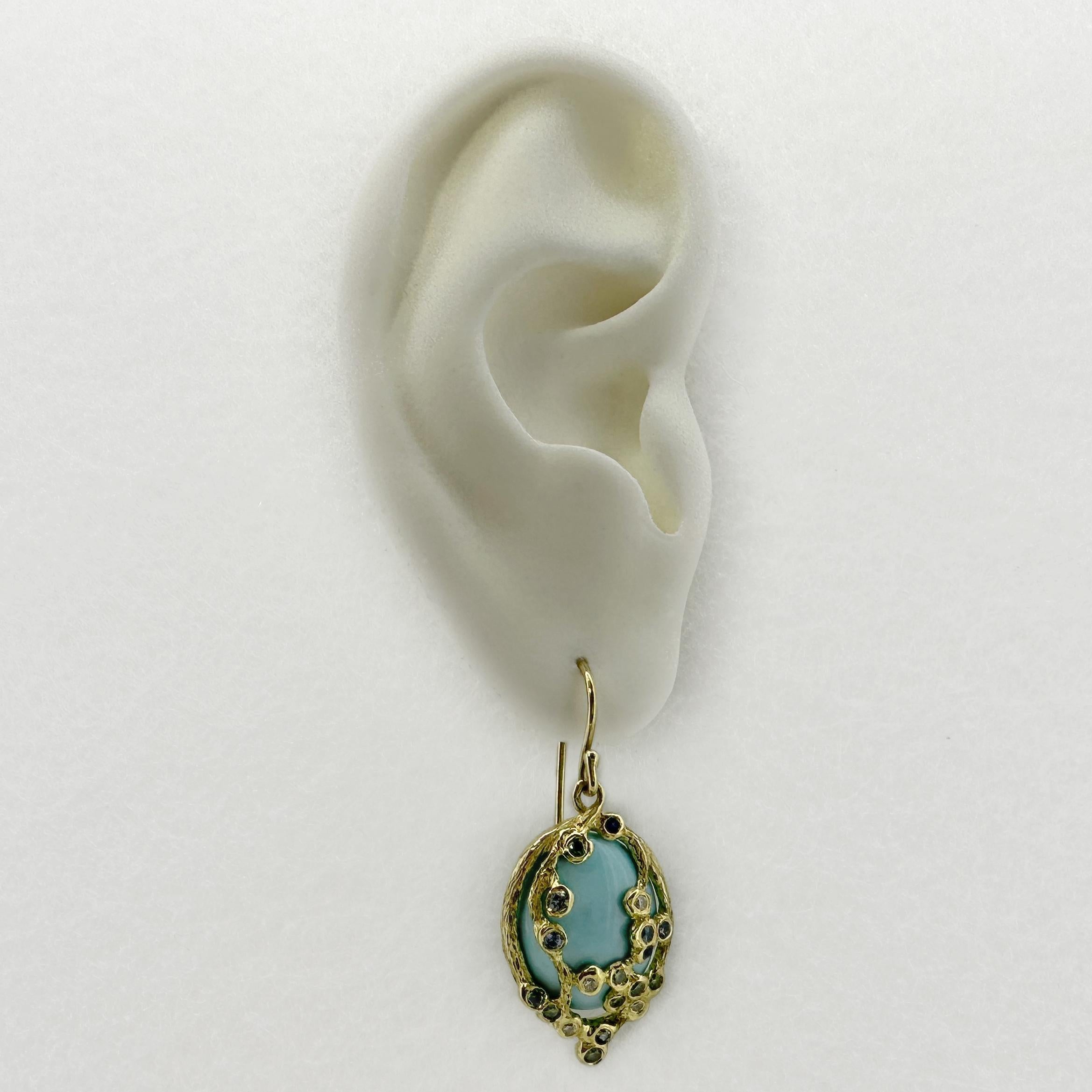 These extraordinary new earrings by Eytan Brandes feature 9 carats of chewy, natural, undyed Sleeping Beauty turquoise.  We purchased these cabochons at a trade show in 2022 from Lunawat Gems, which carries an impressive stock of this costly and