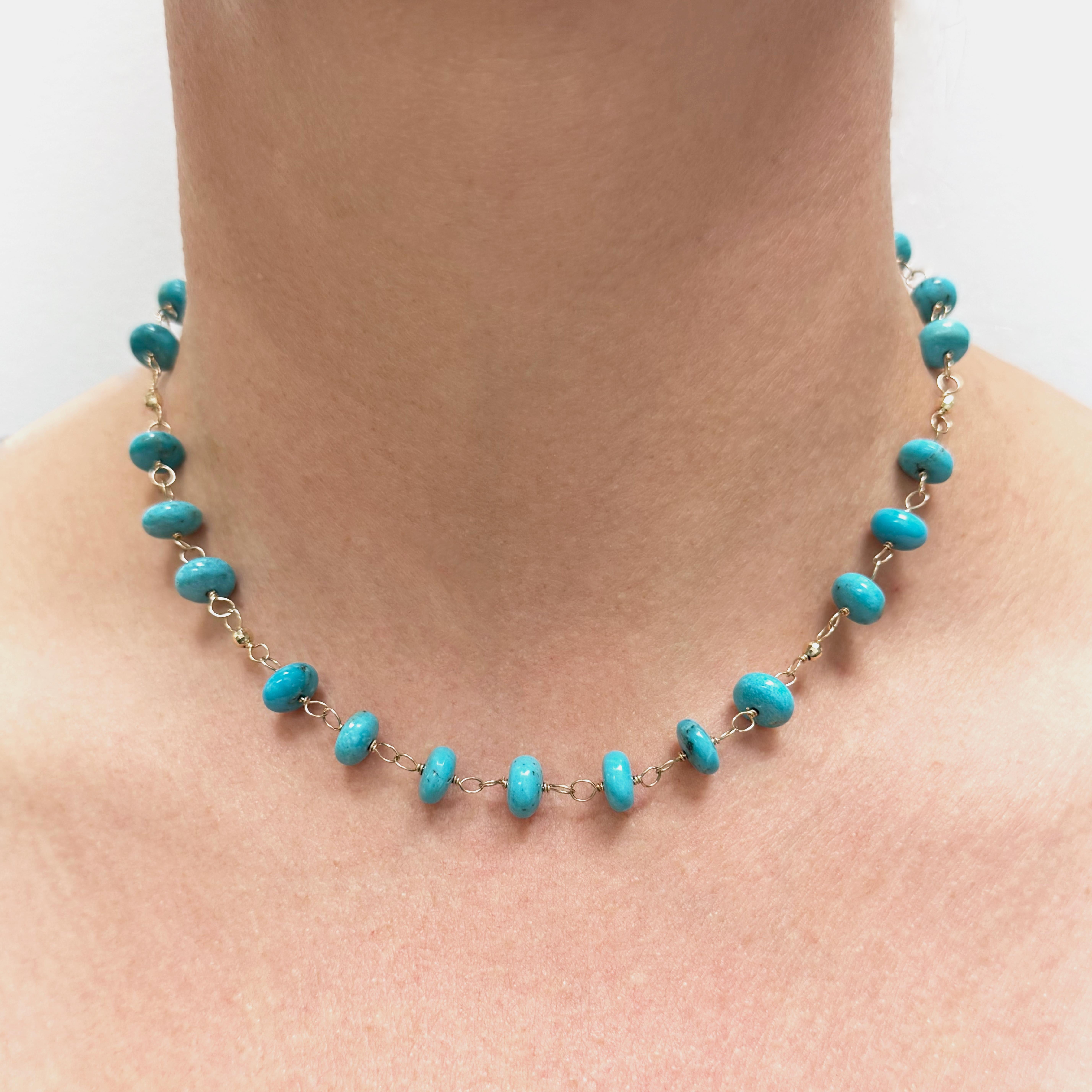 Description
Bold and radiant, this Sleeping Beauty Turquoise necklace is designed to captivate.
Delicately hand wire-wrapped, its vibrant hues are accented by scattered 14k gold faceted balls.
The result is a perfect balance of femininity, elegance,